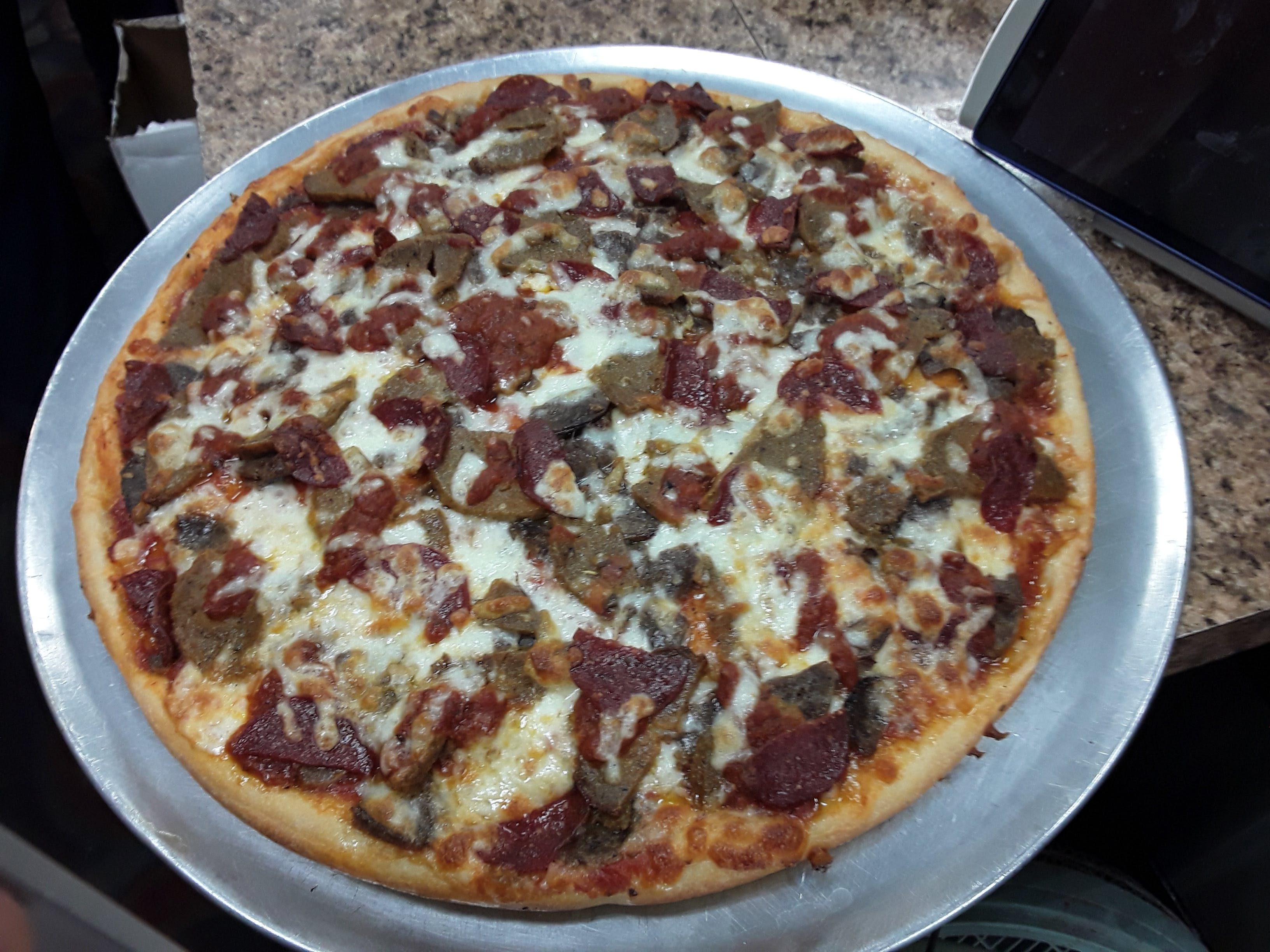Order Meat Lover's Pan Pizza - Pizza food online from Brooklyn's Pizza store, Irvington on bringmethat.com