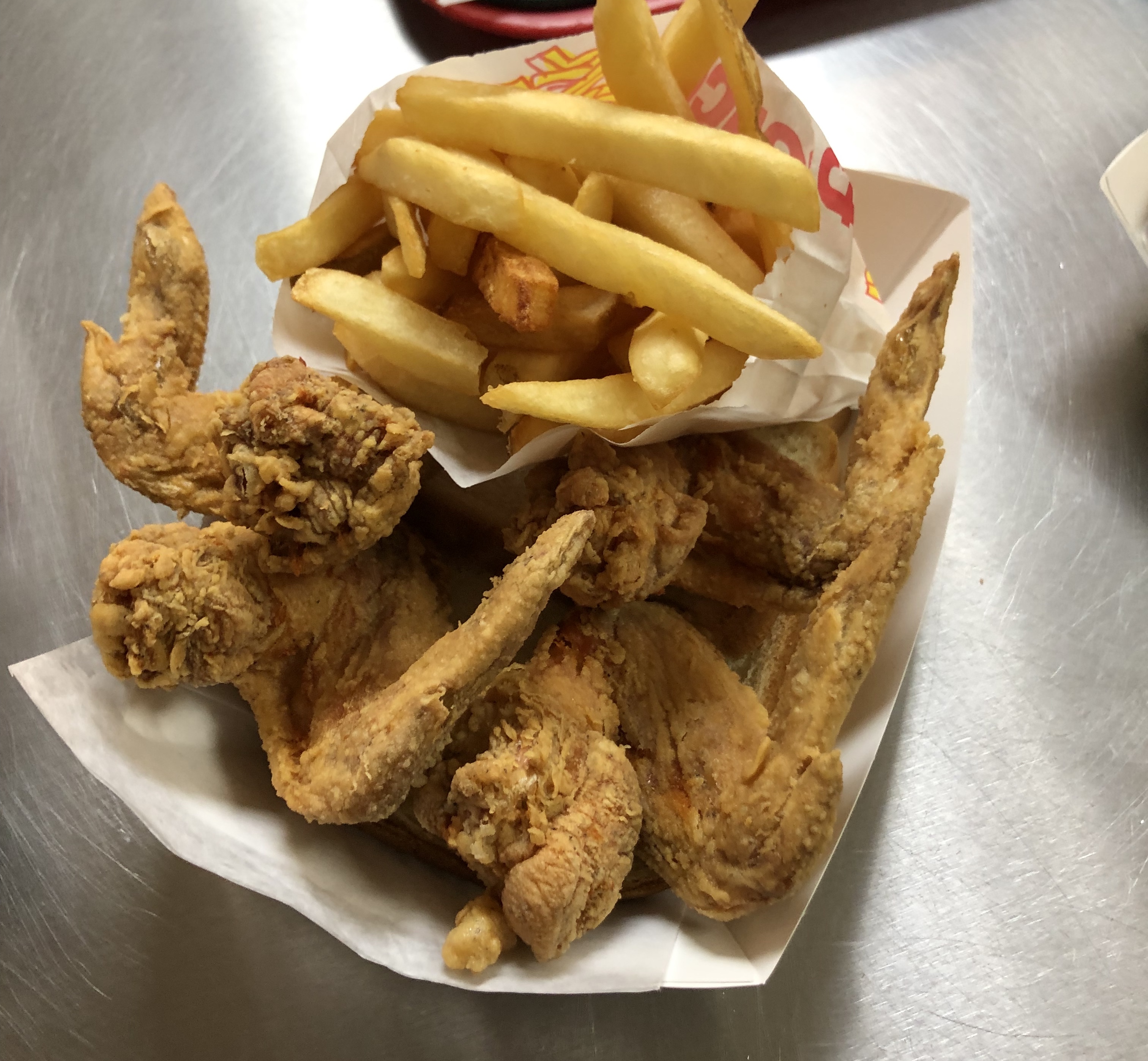 Order 4 Wings food online from Harold's chicken shack #36 store, Chicago on bringmethat.com