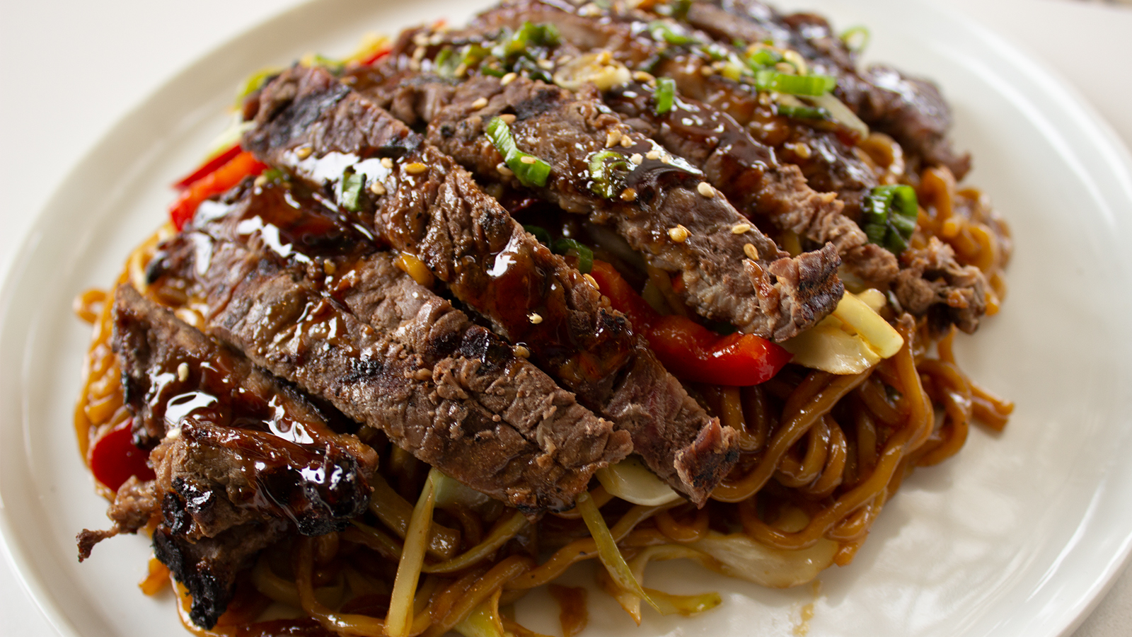 Order Yakisoba Noodle and Steak Combo Plate food online from Sansai Japanese Grill store, Santa Monica on bringmethat.com