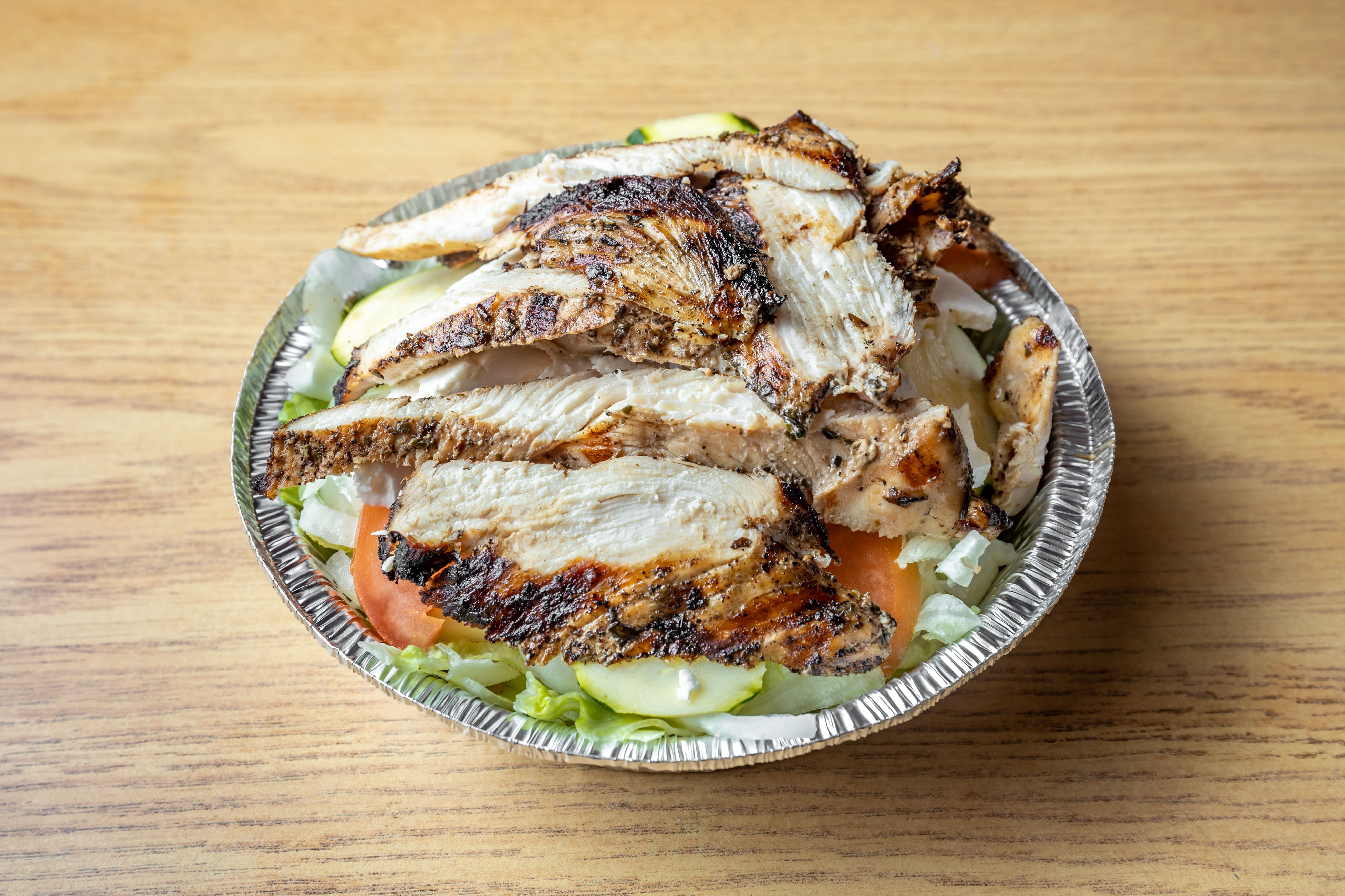 Order 5. Grilled Chicken Greek Salad - Small food online from Big John's Pizza store, Queens Village on bringmethat.com