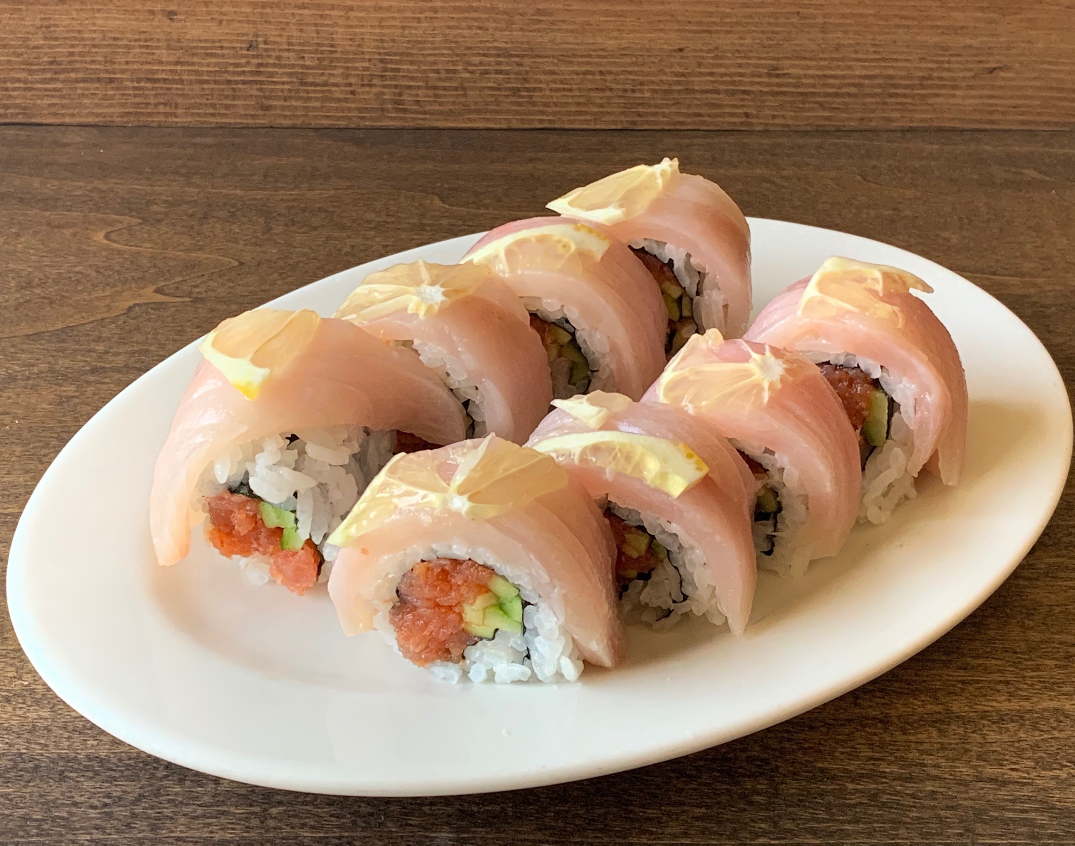 Order Yellowtail Lemon Roll food online from Minato Sushi store, Lake Forest on bringmethat.com