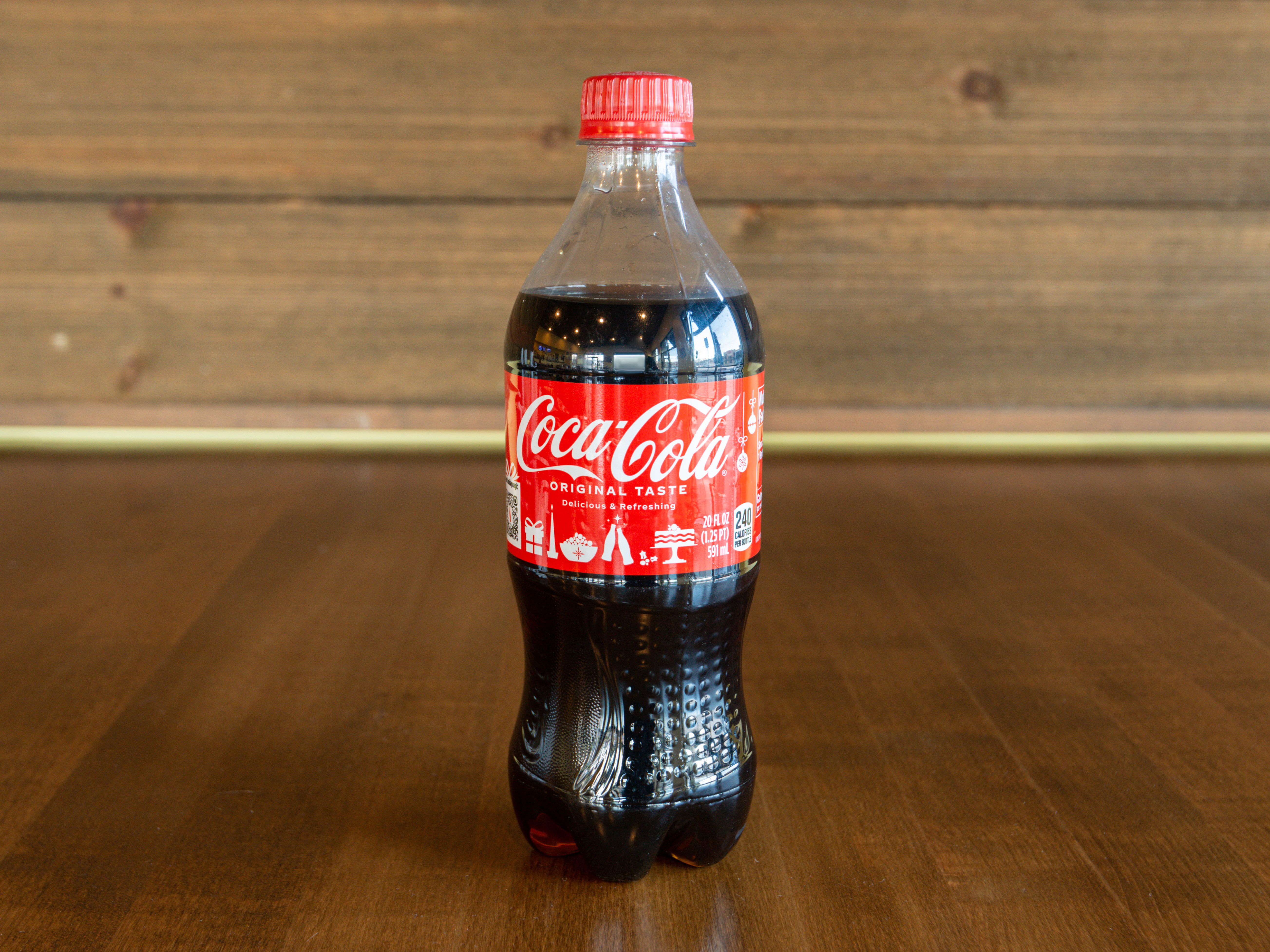 Order 20 oz Bottled Coca Cola food online from Flavorshack Hot Chicken & Ribs store, Duncan on bringmethat.com