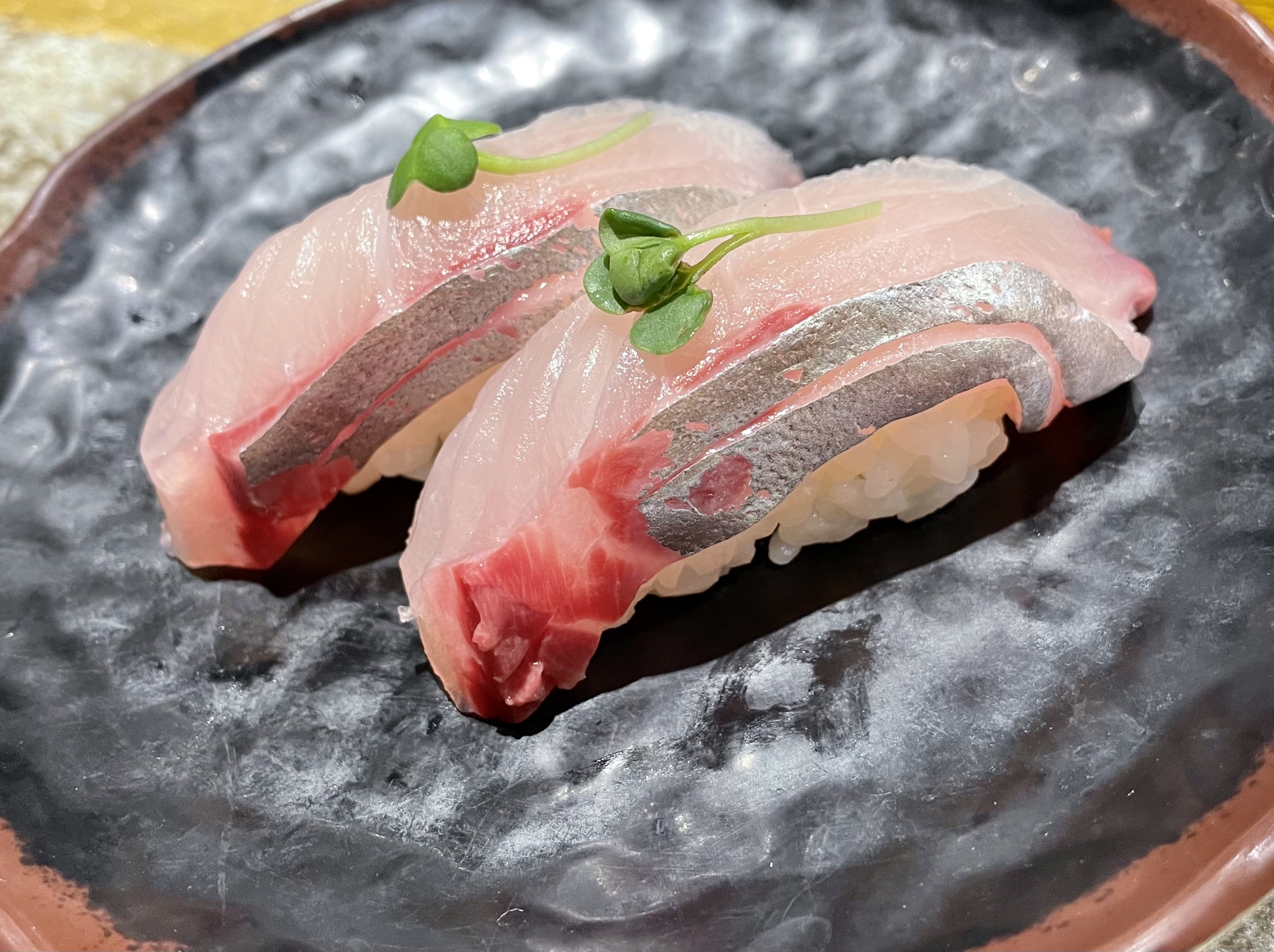 Order Shima Aji Nigiri food online from Blue Fin Sushi store, San Francisco on bringmethat.com