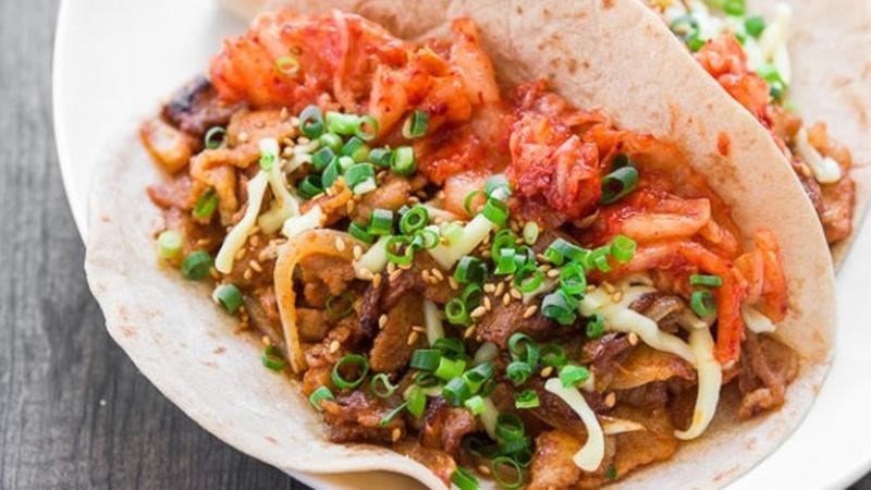 Order Any Taco with Kimchi food online from K Bbq Taco store, Decatur on bringmethat.com