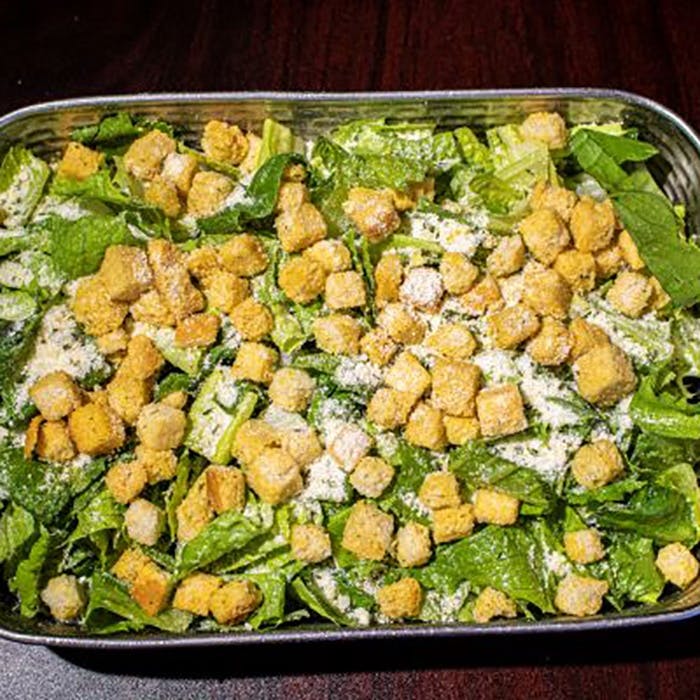Order Caesar Salad - Medium food online from Brothers Pizza store, Las Vegas on bringmethat.com