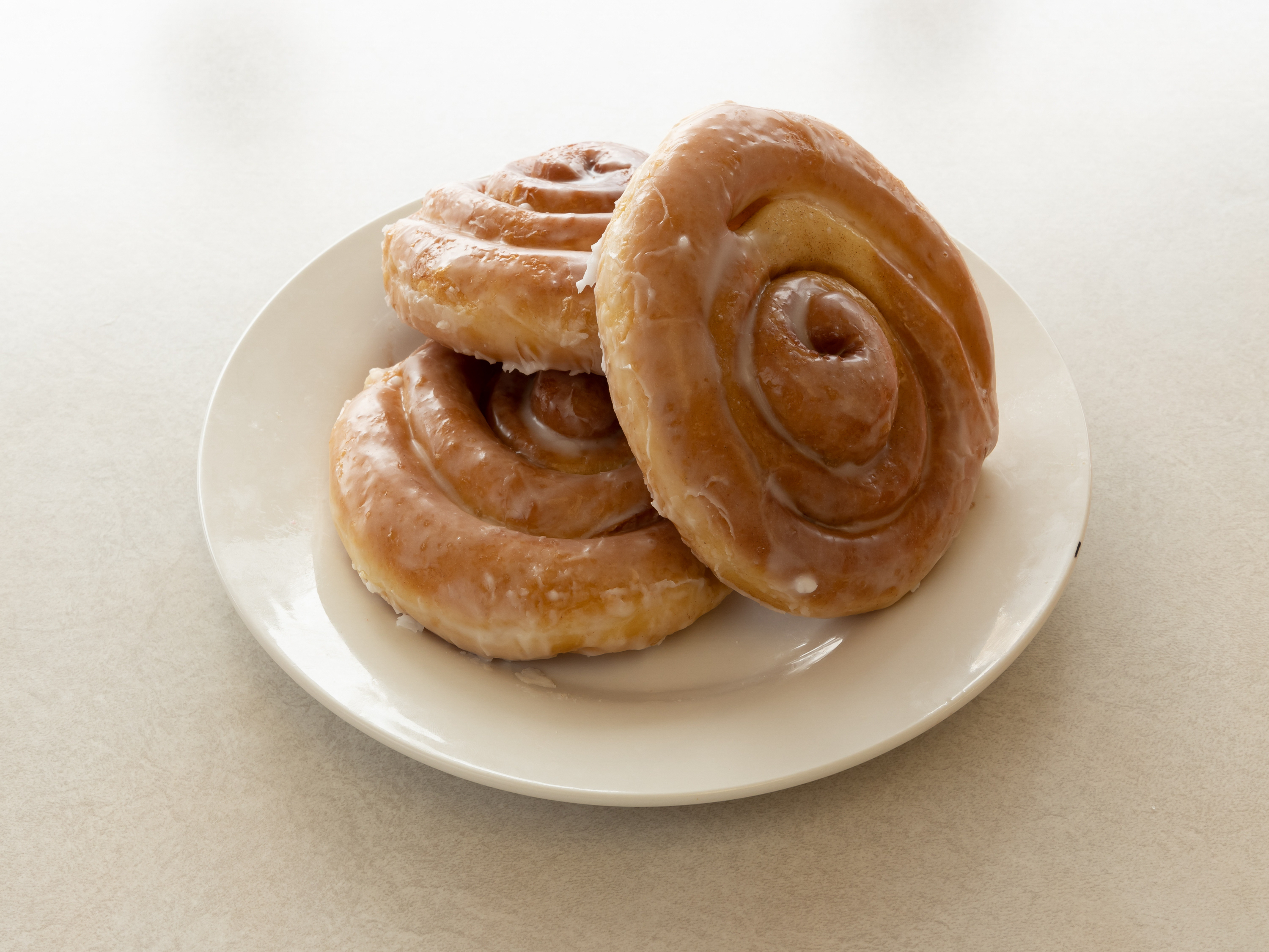 Order Cinnamon Roll Donut food online from Mr. Donut And Kolache store, Jersey Village on bringmethat.com