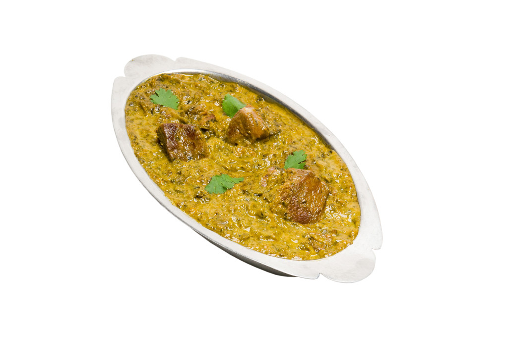 Order Lamb Saag food online from Taste Of India Grill store, Bountiful on bringmethat.com