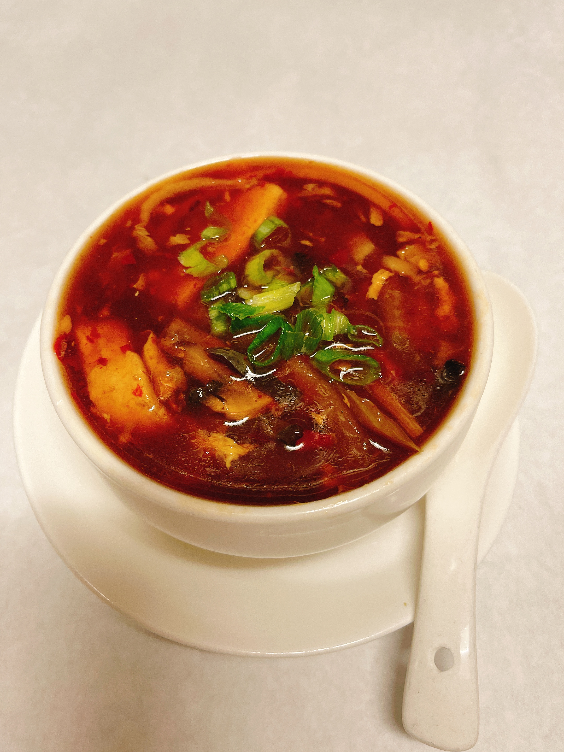 Order Hot and Sour Soup food online from Pearls Chinese Restaurant store, New York on bringmethat.com