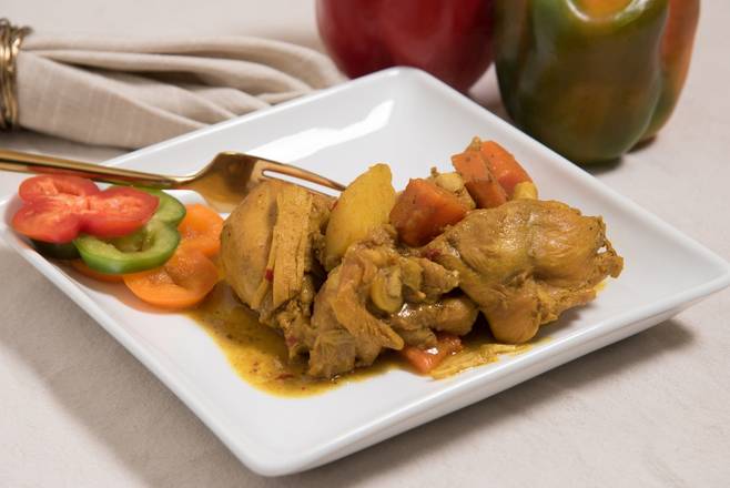 Order Small Curried Chicken food online from Coconut Breeze Cuisine store, Lansdowne on bringmethat.com
