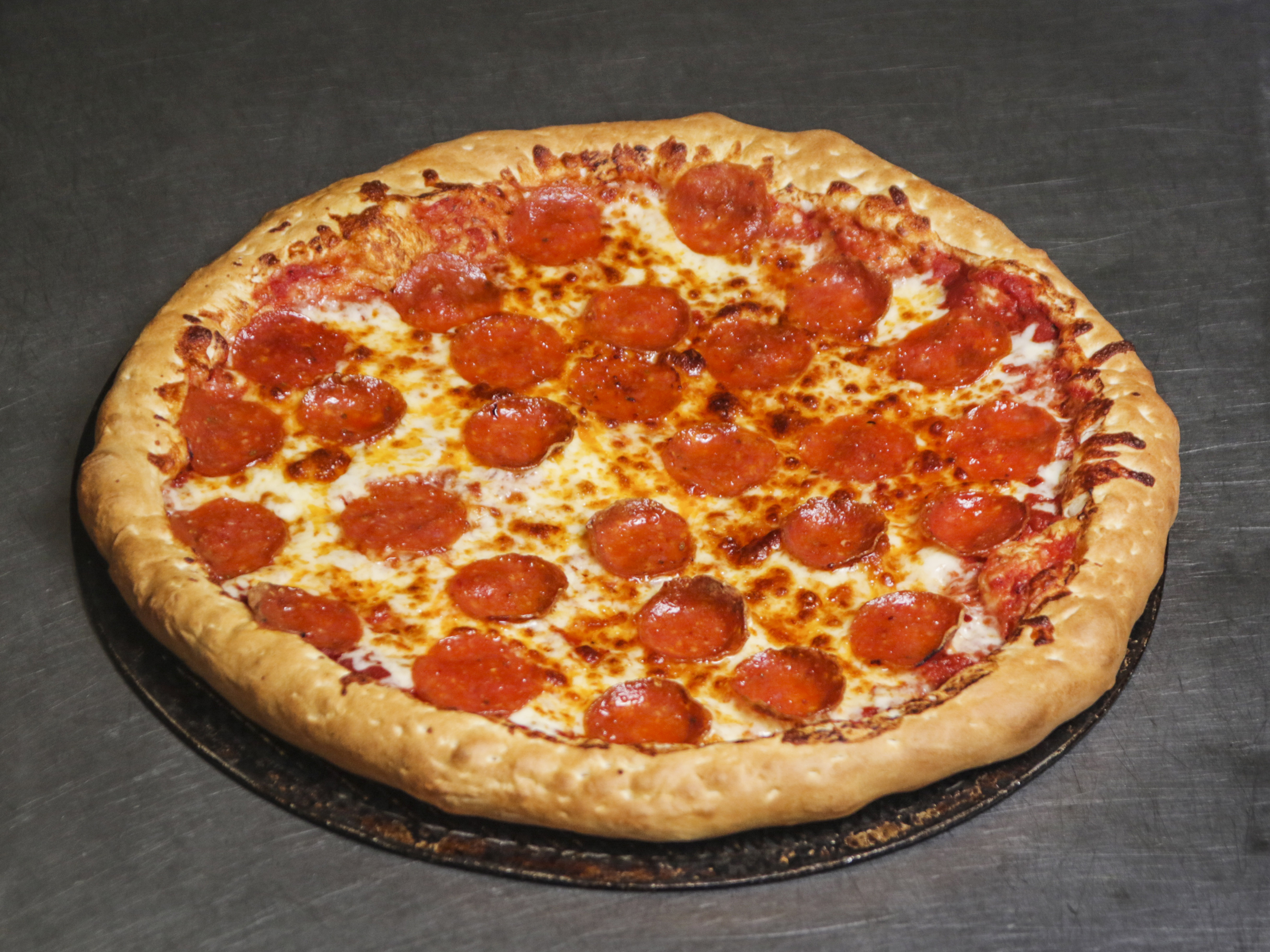 Order Round Cheese Pizza and 1 Item food online from Toarmina Pizza store, Madison Heights on bringmethat.com