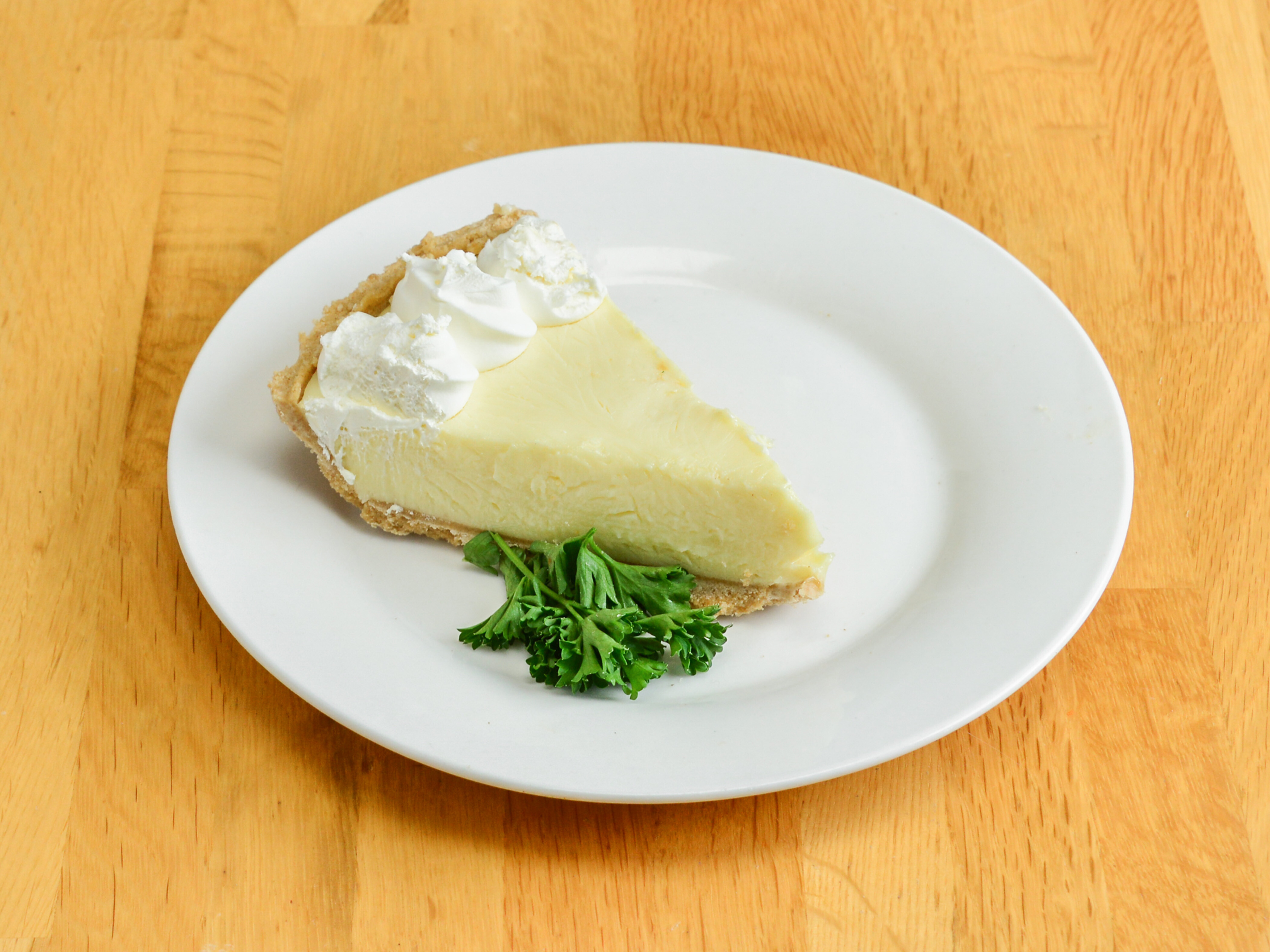 Order 1 Slice of Key Lime Pie food online from Grumpy Gary Grill store, Huntington on bringmethat.com
