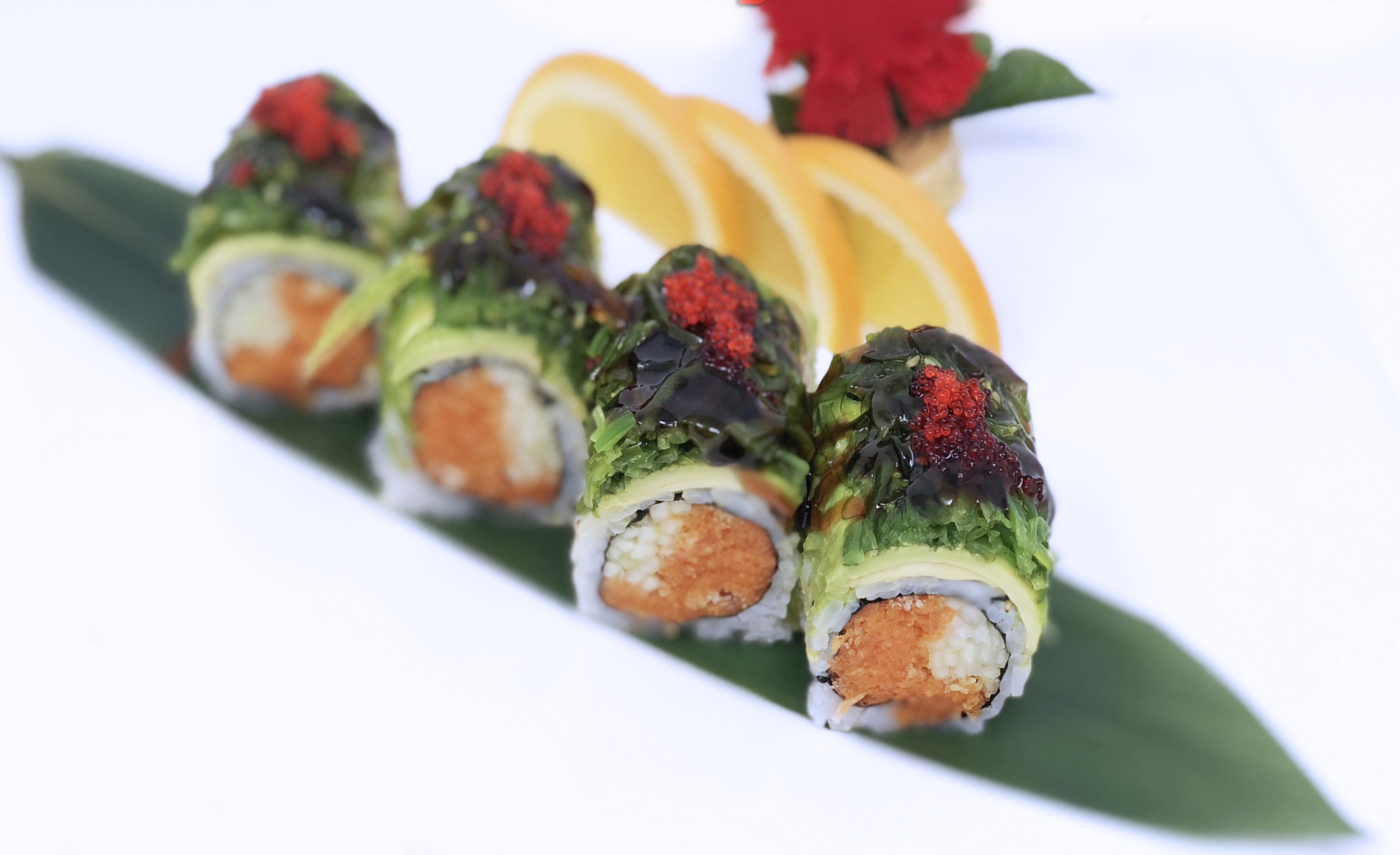 Order Green Dragon Roll food online from Izumi Japanese Restaurant store, Youngstown on bringmethat.com