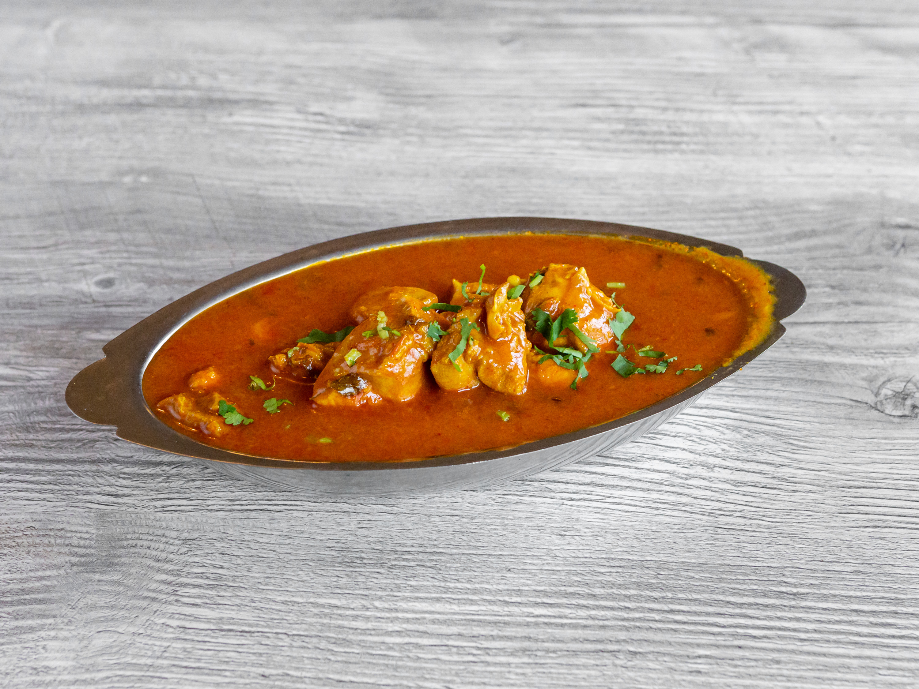 Order Chicken Curry food online from Indian Village Restaurant store, Greenfield on bringmethat.com