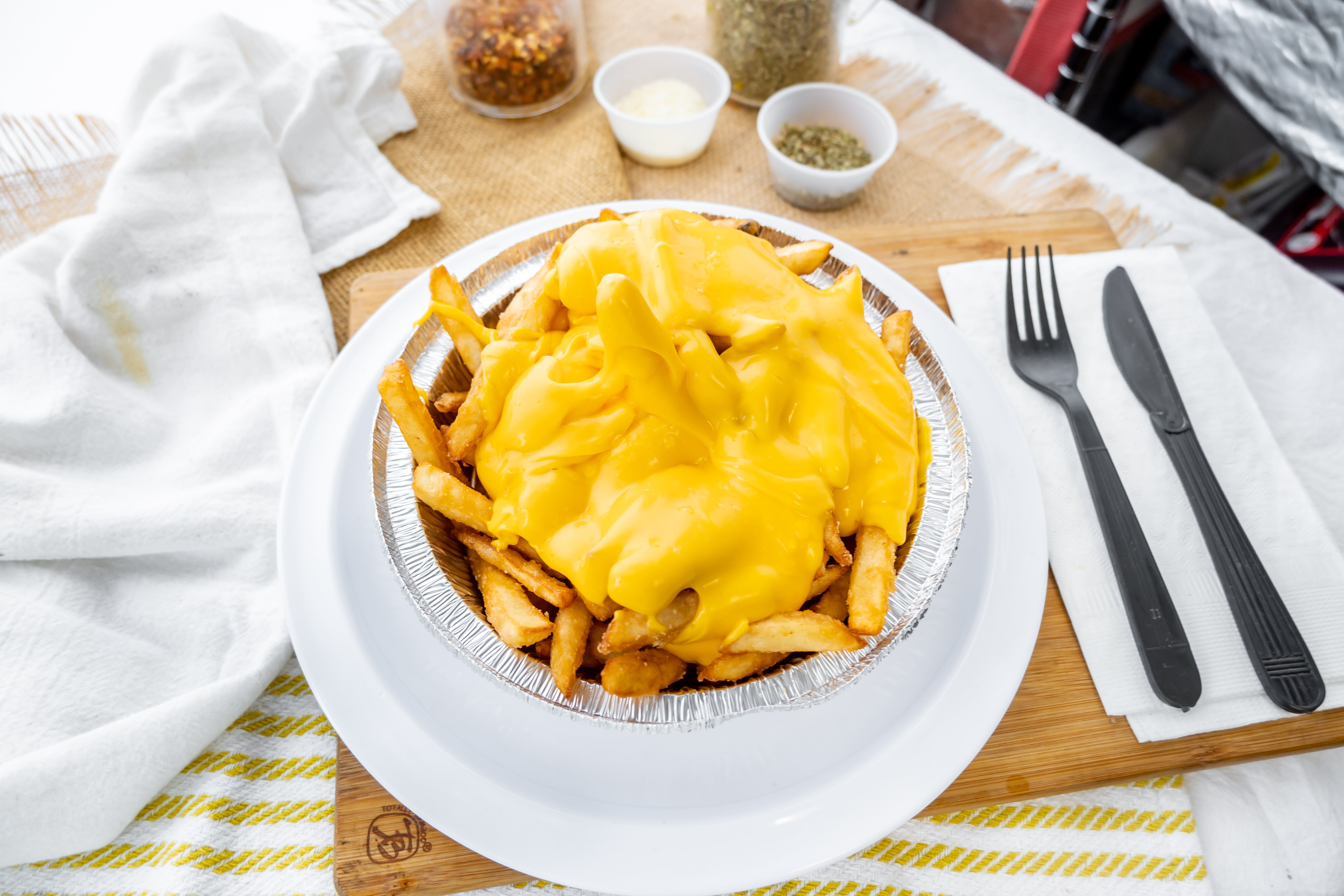 Order Cheese Fries - Appetizer food online from Pete Famous Pizza store, Philadelphia on bringmethat.com