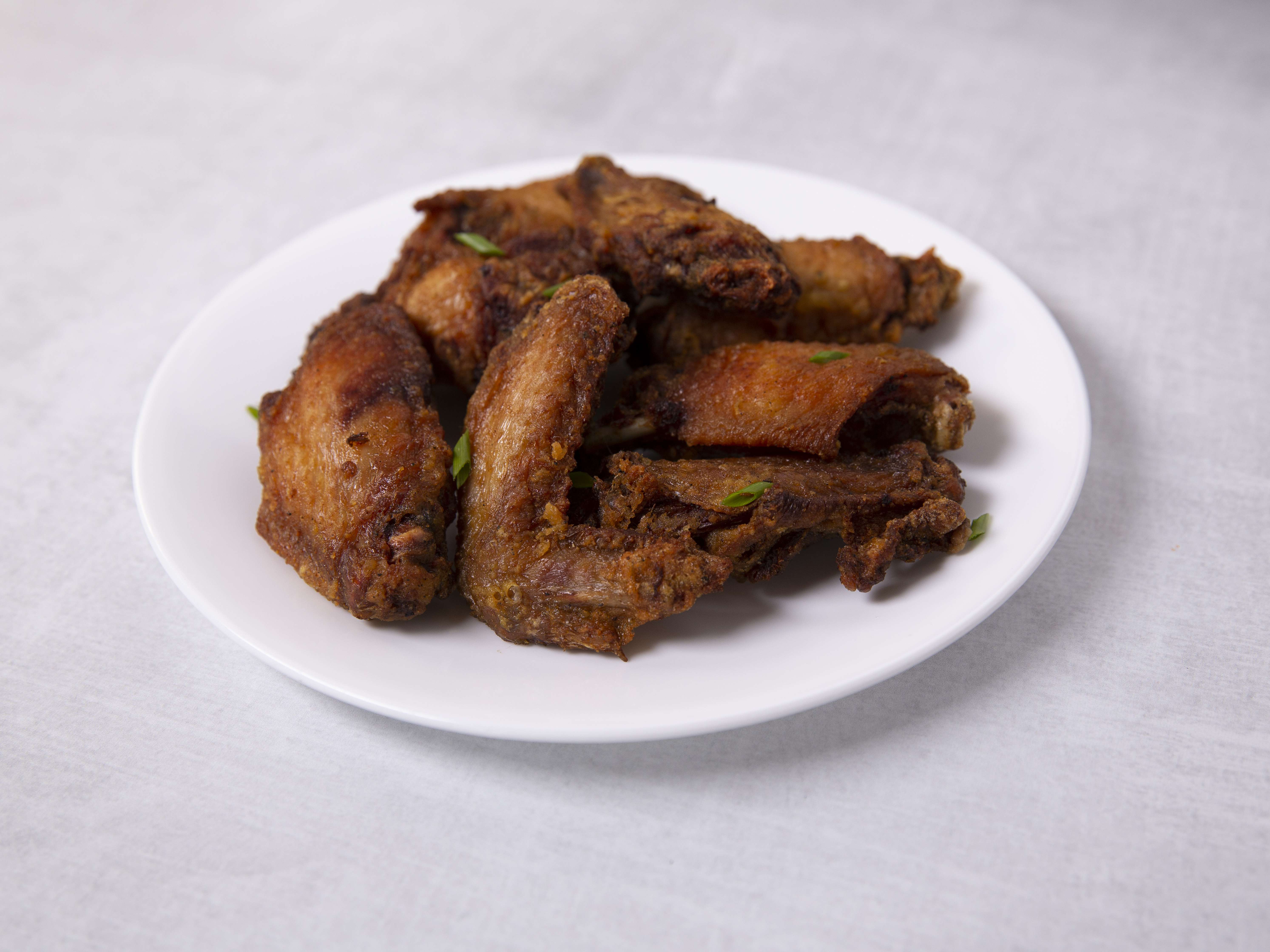 Order 60. Jin's Hot Wing food online from Jin Chinese Kitchen store, Los Angeles on bringmethat.com