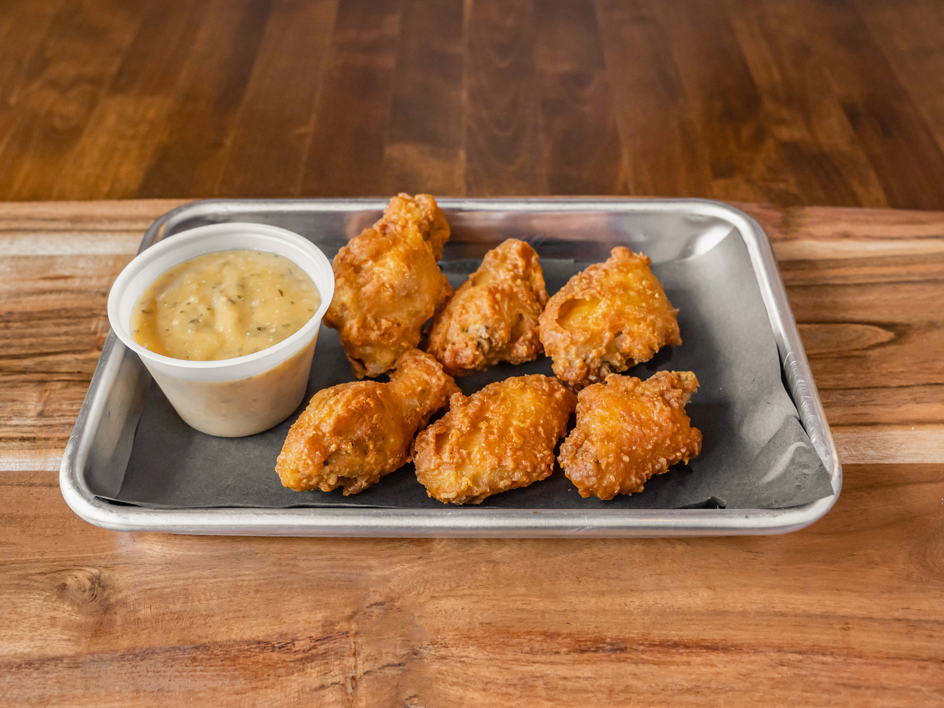 Order Chicken Wings - (6 wings) food online from Empire Bagel store, Cross River on bringmethat.com