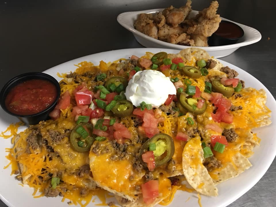 Order Nachos Supreme with Beef  food online from Windmill Grill store, Kokomo on bringmethat.com