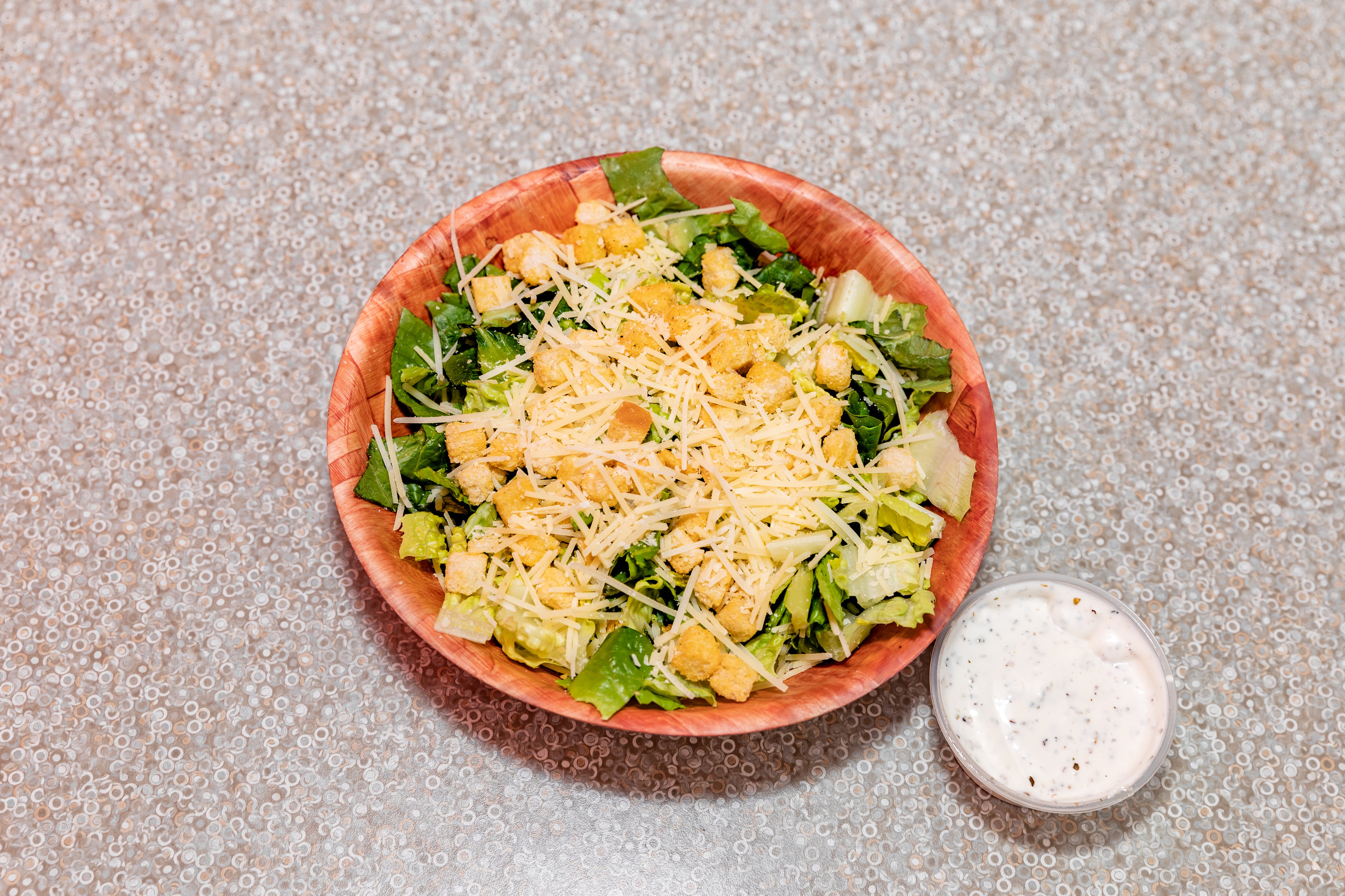 Order Caesar Salad - Medium food online from Antelope Market store, Antelope on bringmethat.com