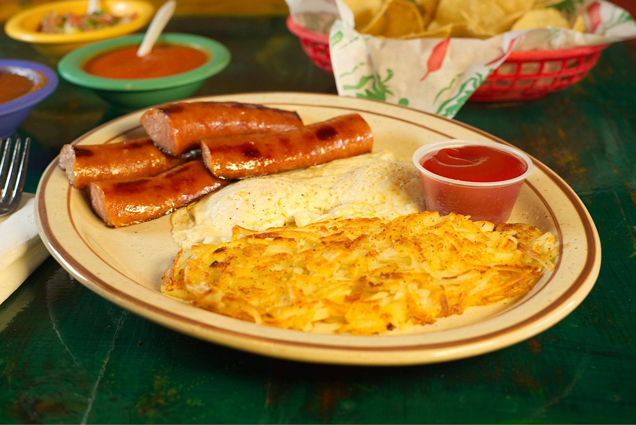 Order Smoked Sausage with Eggs food online from La Morena Restaurant & Cantina store, El Paso on bringmethat.com