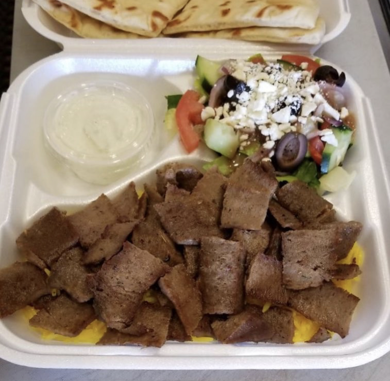 Order Gyro meat Plate food online from Hummus Mediterranean Kitchen store, San Diego on bringmethat.com