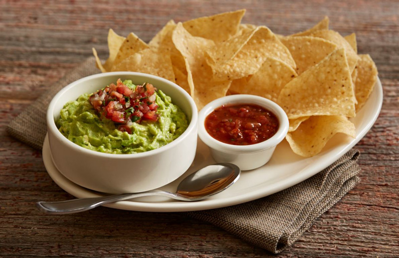 Order Housemade Guacamole & Chips food online from BJs Restaurant & Brewhouse store, Greenwood on bringmethat.com