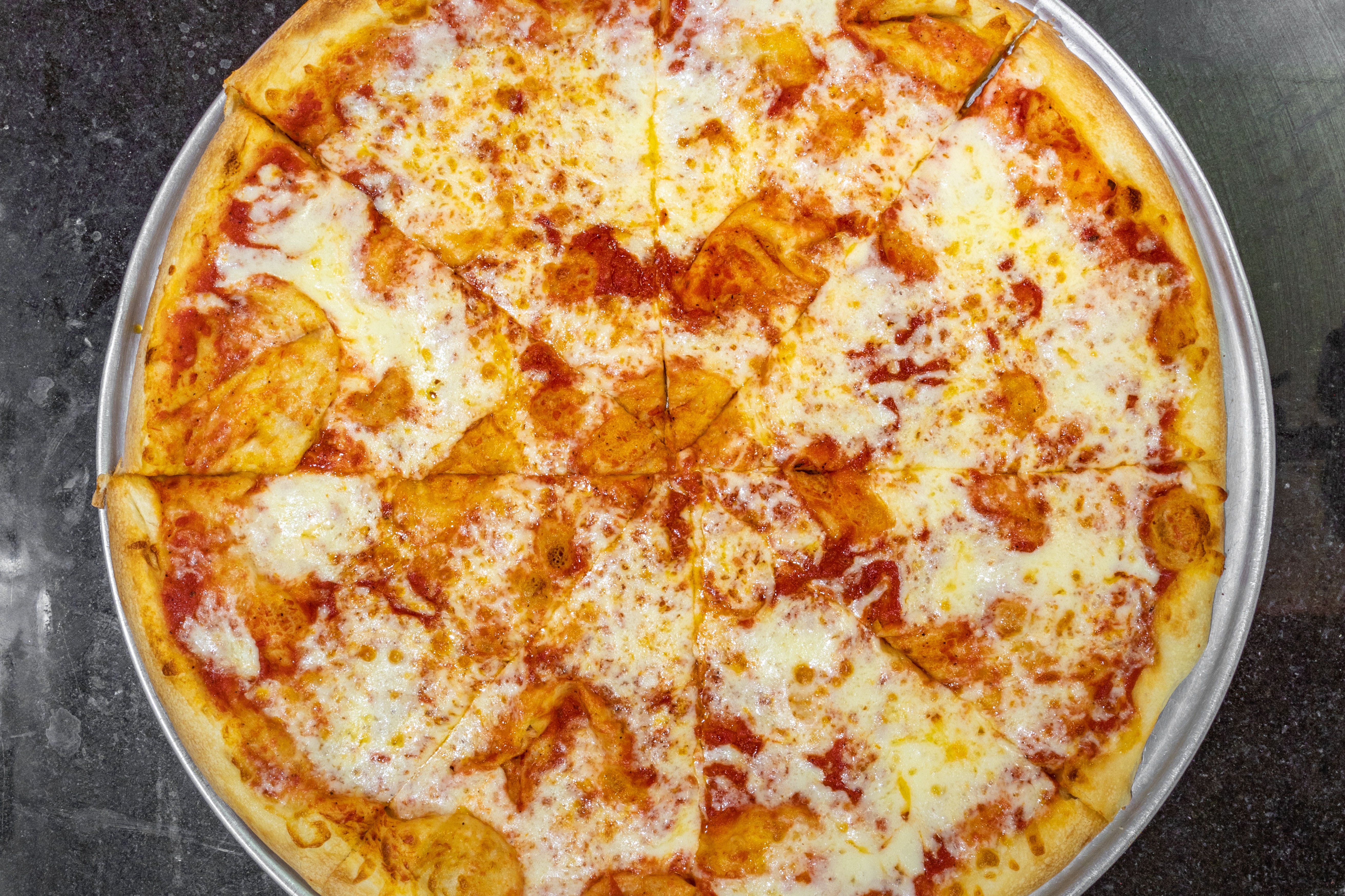 Order Cheese Pizza - Medium 12" food online from Gus Ny Pizza store, Phoenix on bringmethat.com