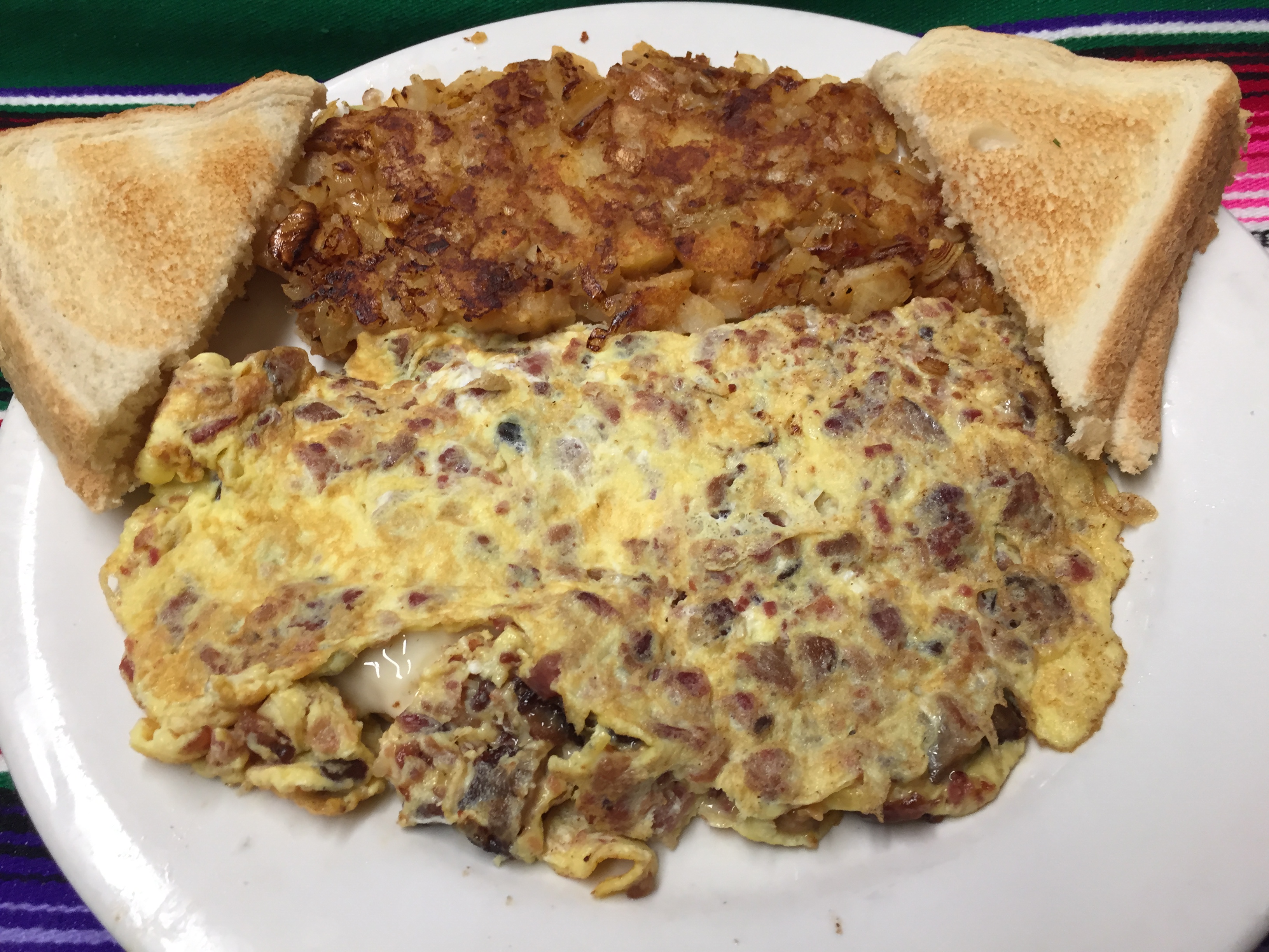 Order Cheese Omelette with Bacon food online from Montes Cafe store, Seaside Heights on bringmethat.com
