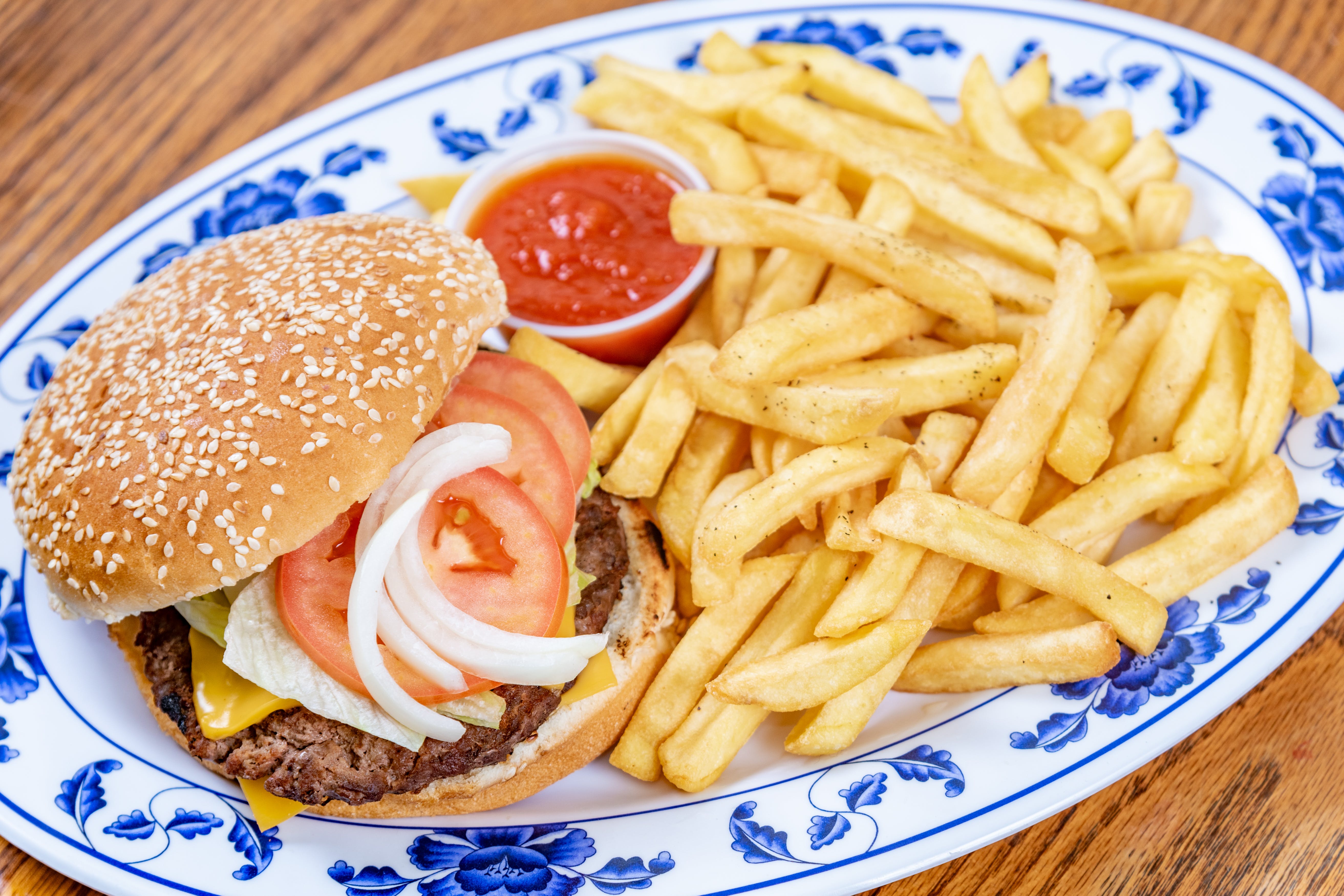 Order Cheeseburger with French Fries - Burger food online from La Casa Mia Pizzeria & Restaurante store, Brooklyn on bringmethat.com