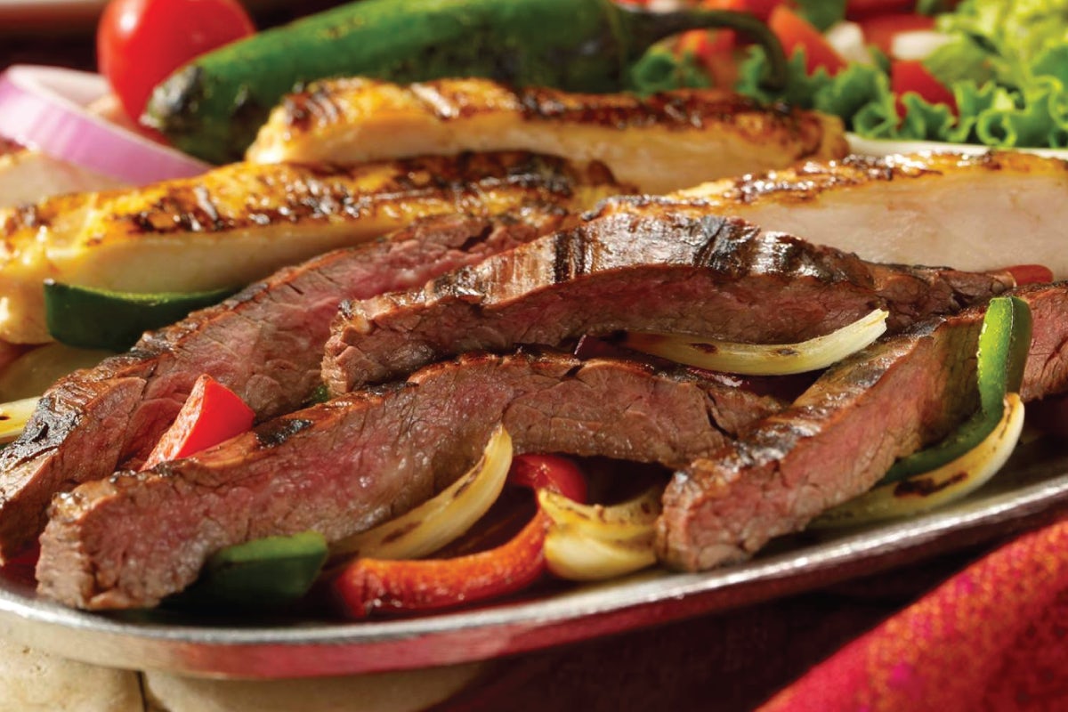 Order Steak and/or Chicken Fajitas for Two food online from Uncle Julio's store, Durham on bringmethat.com