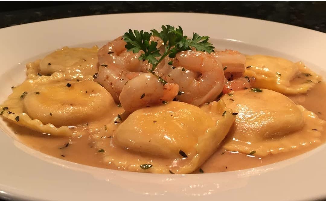 Order Lobster Ravioli - 4 Pieces food online from Sam Italian Cafe store, Fort Worth on bringmethat.com