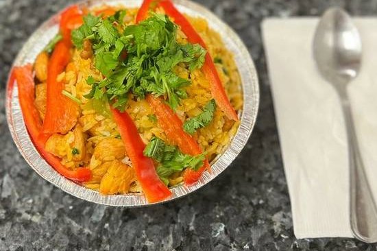 Order Rice with Chicken / Arroz con Pollo  food online from La barca restaurant store, New York on bringmethat.com