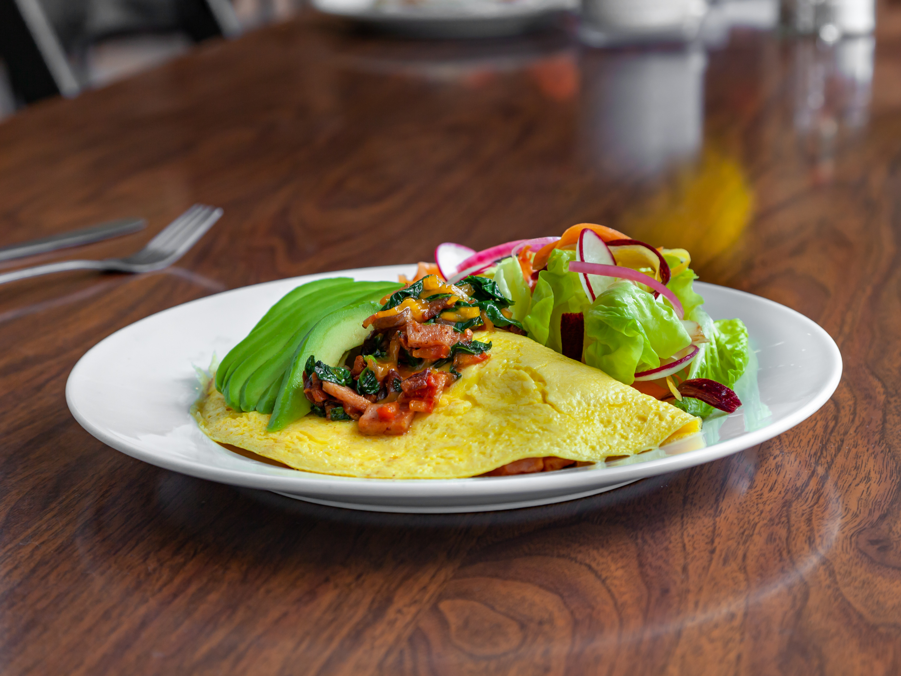 Order California Omelette  Plate food online from Bogy Market Ca Bistro store, South San Francisco on bringmethat.com