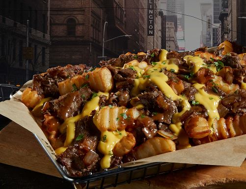 Order Philly Cheesesteak Fries food online from Nathan Famous store, Fitchburg on bringmethat.com
