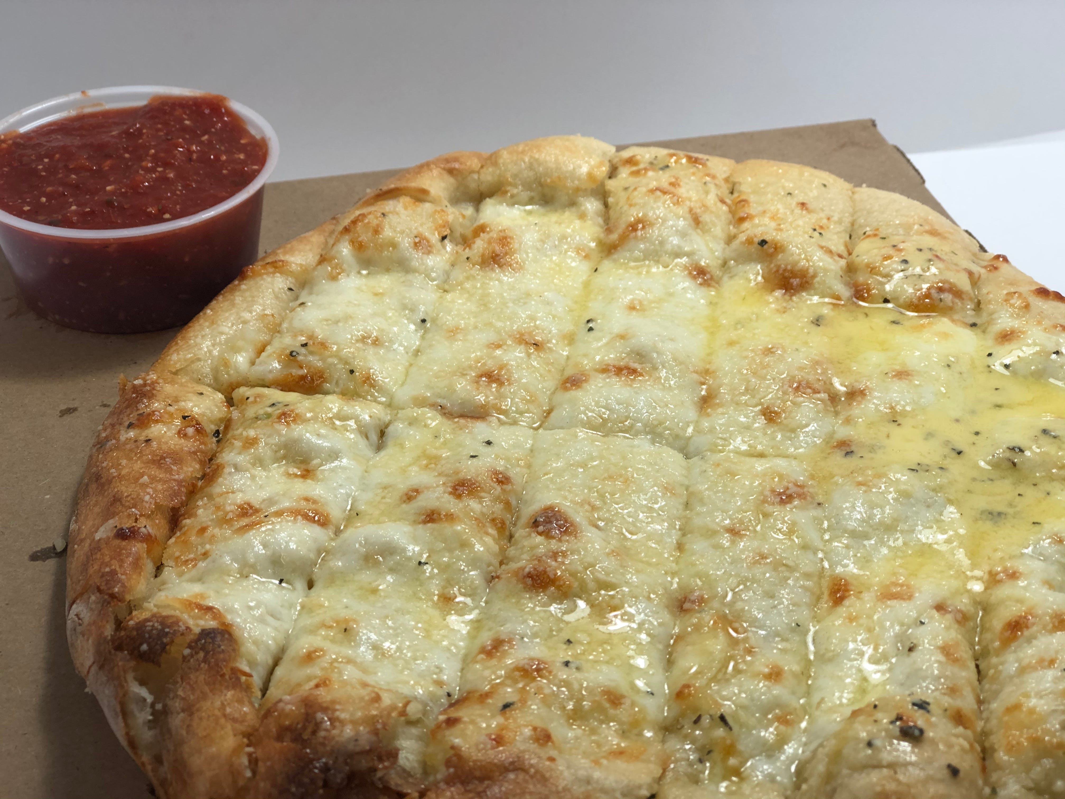 Order Cheesesticks - Side food online from Lombardo Pizza store, Wyoming on bringmethat.com
