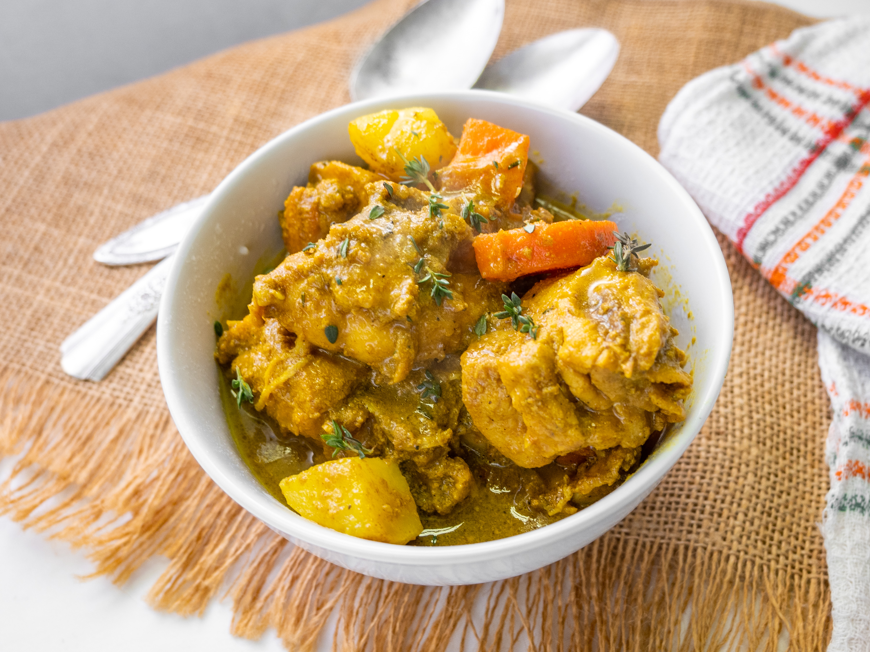 Order Curried Chicken food online from Grapes Real Jamaican Cuisine store, Wilmington on bringmethat.com