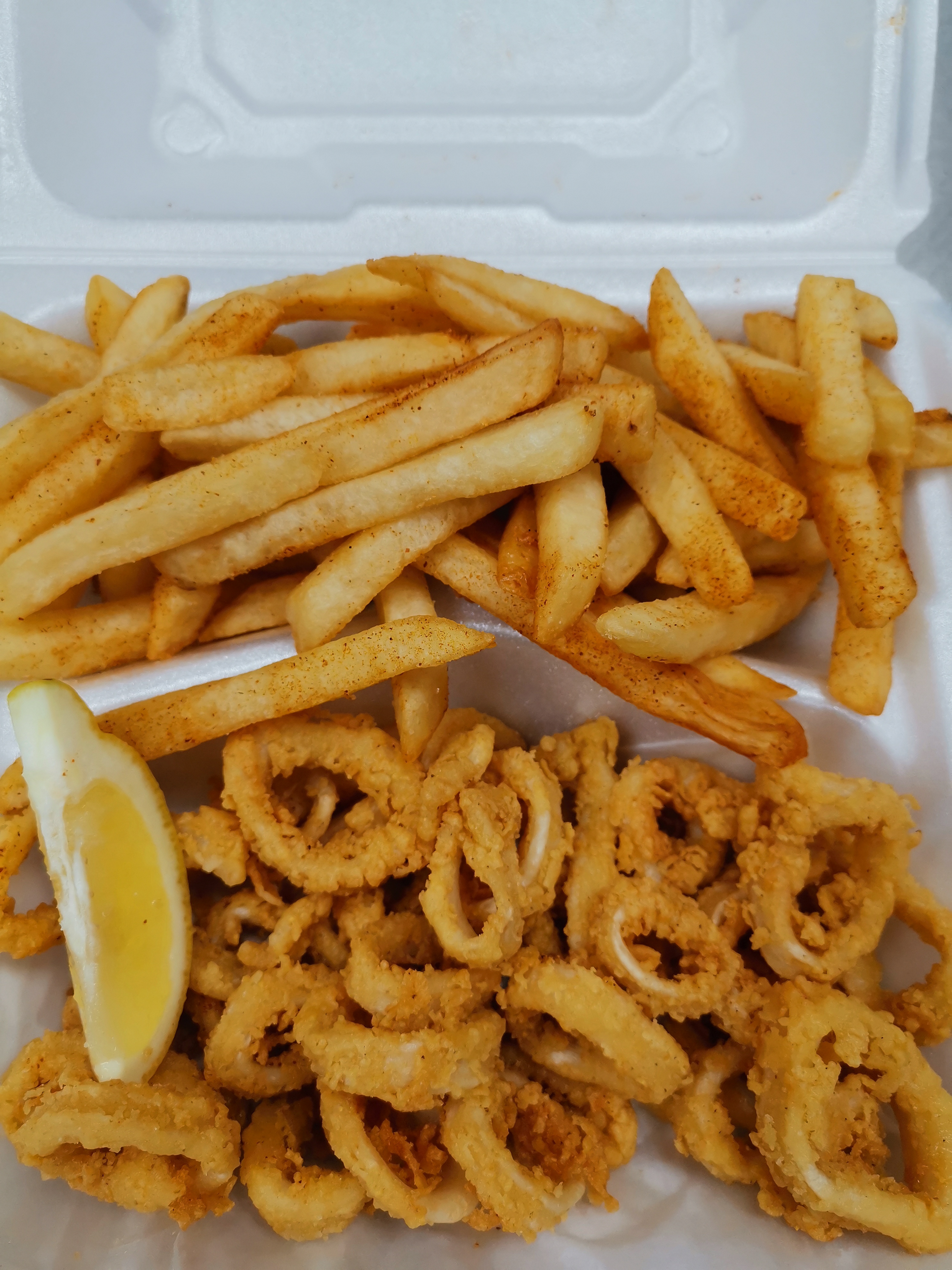 Order Fried Calamari food online from Cajun Seafood & Grill store, Greensboro on bringmethat.com