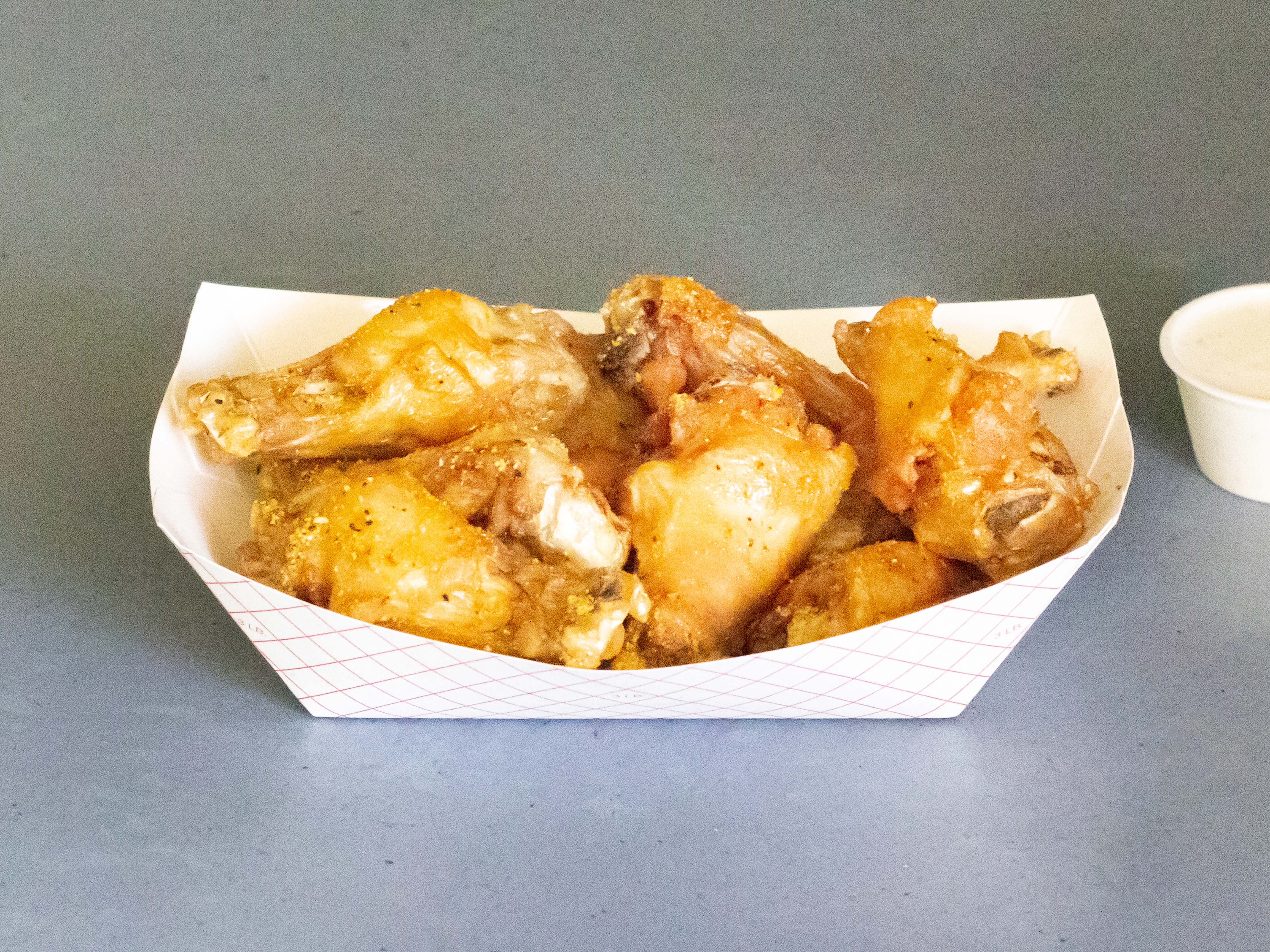 Order 10 wings food online from Manhattan Pizza & Subs store, Greensboro on bringmethat.com