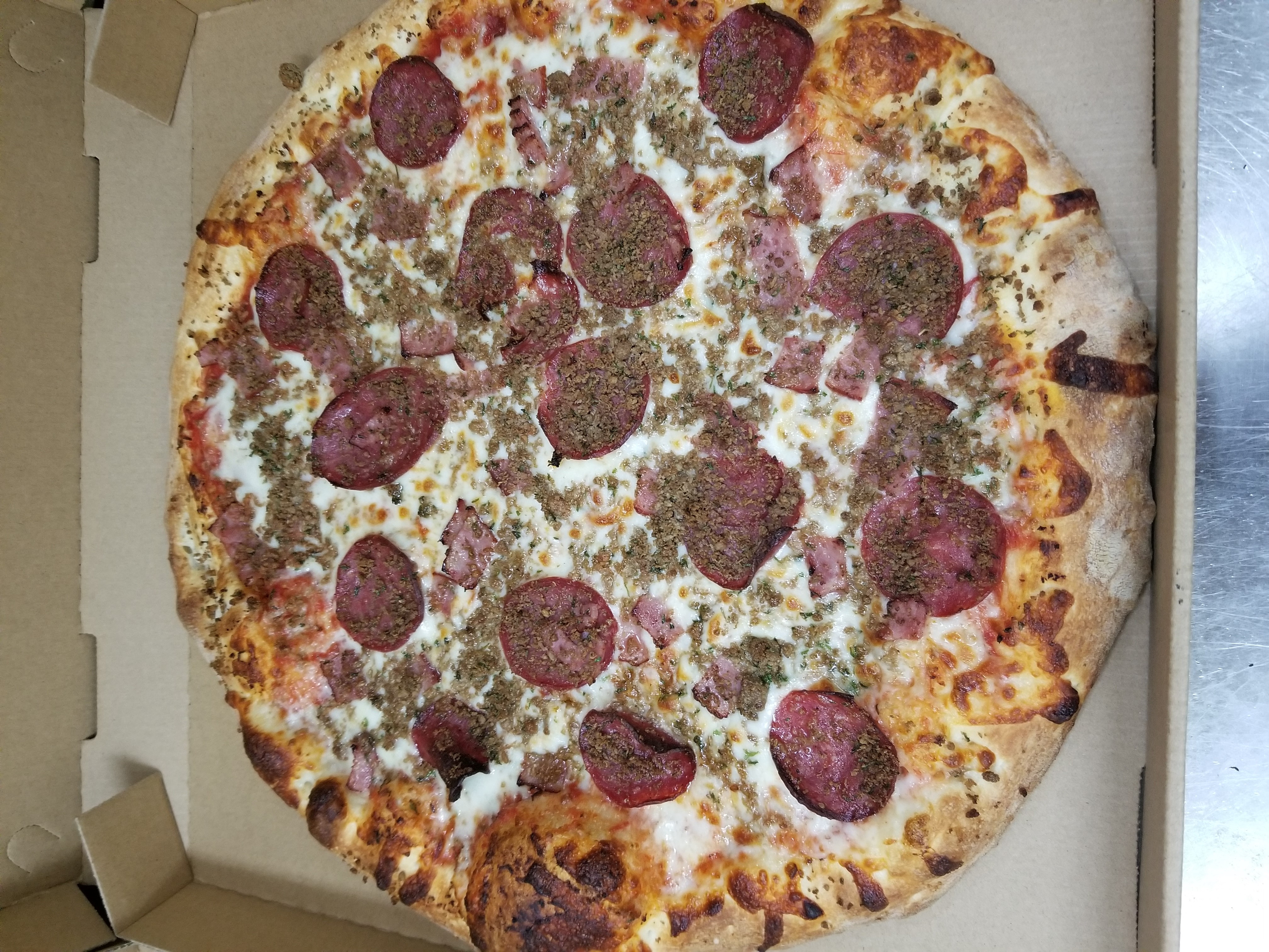 Order Meat Eater Pizza food online from Golden Halal Pizza store, Dearborn Heights on bringmethat.com
