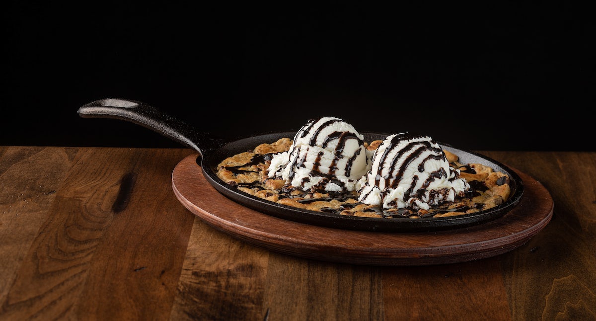 Order The Original Cookie Skillet™ food online from East Coast Wings + Grill store, High Point on bringmethat.com
