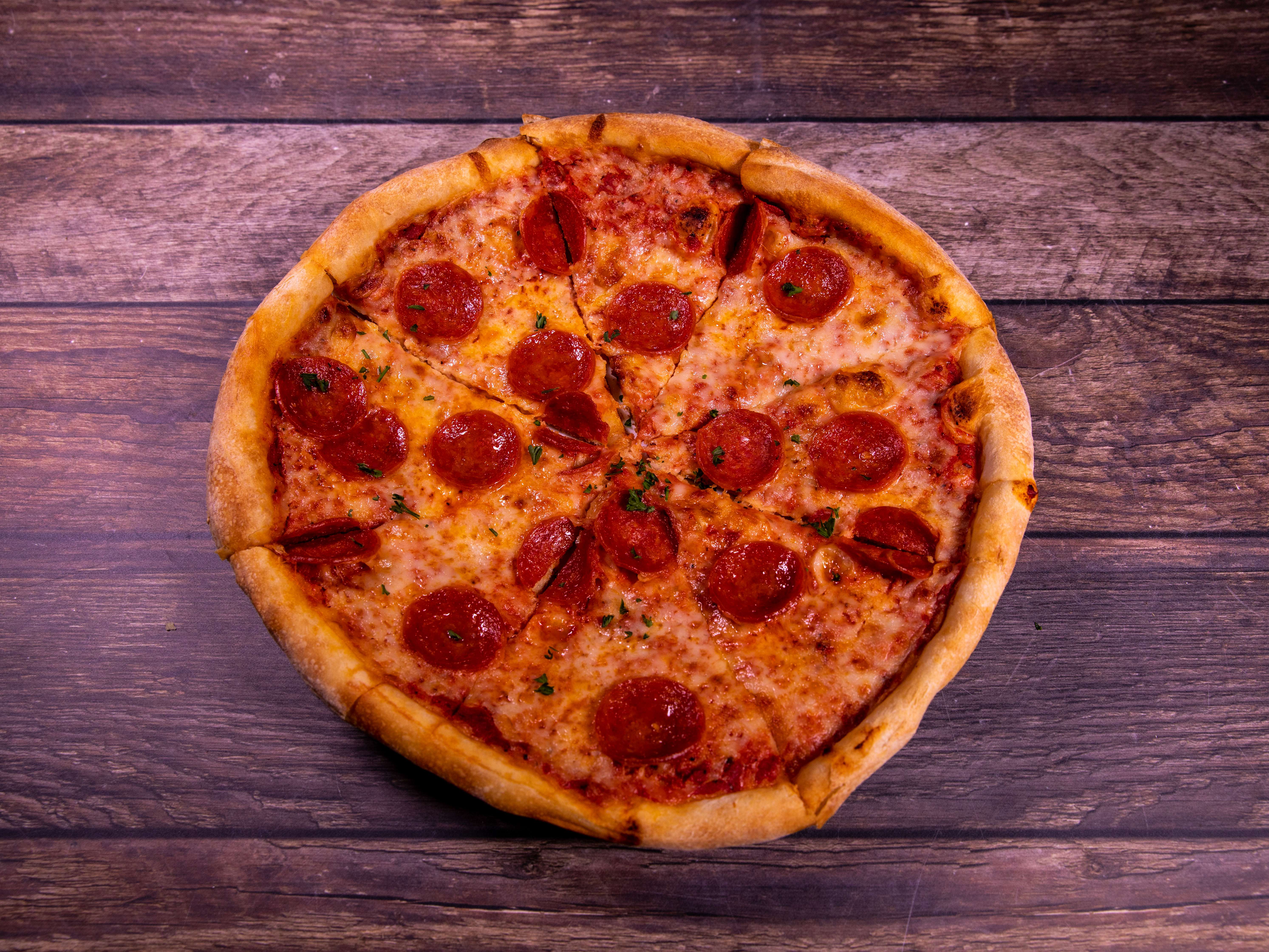 Order 1-Item Pizza food online from Brothers Pizza and Pasta store, Carrollton on bringmethat.com