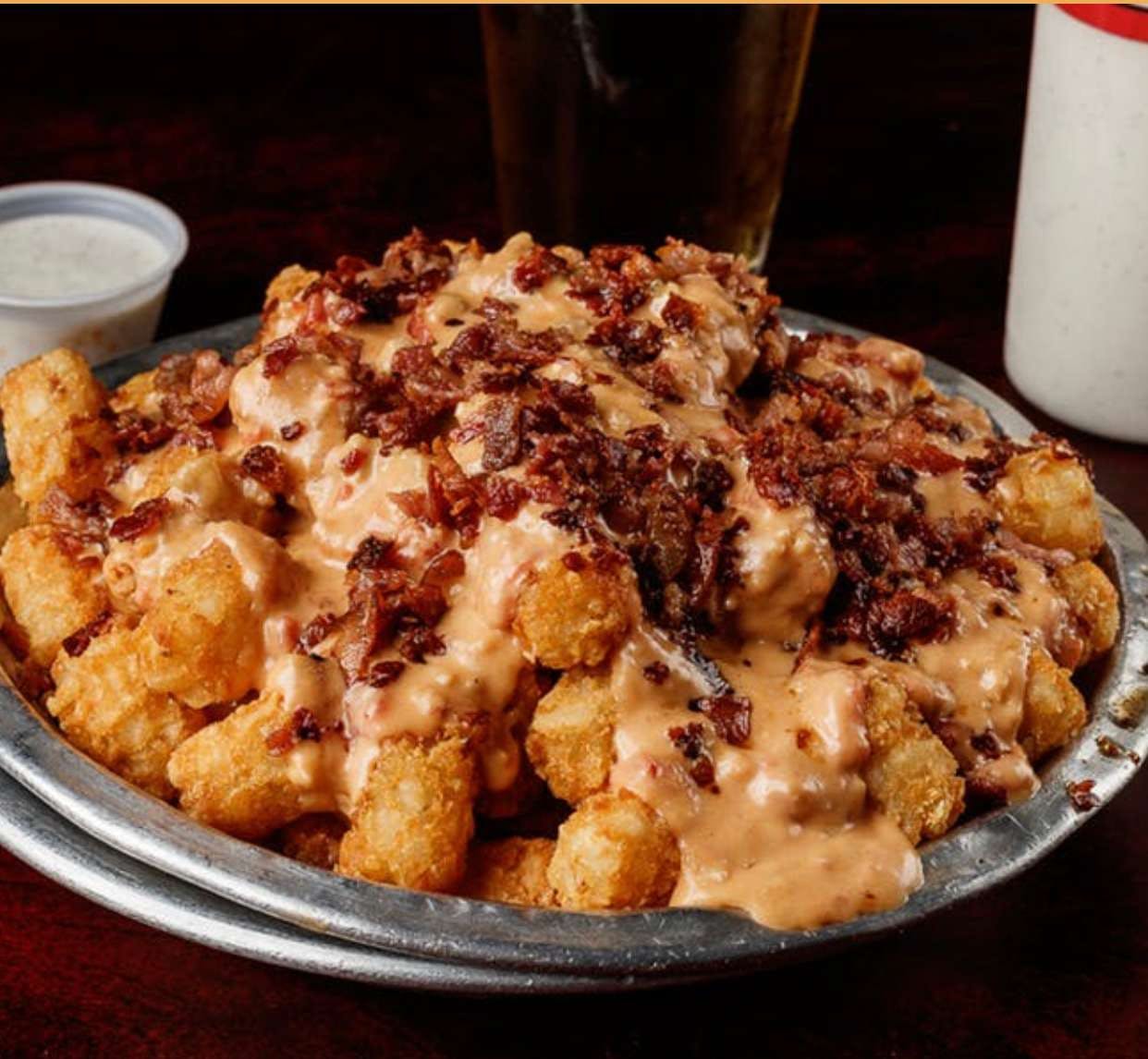 Order Cheesy Bacon Queso Tots - Half Order food online from Wings Pizza N Things store, Temple on bringmethat.com