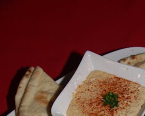 Order   Side  Hummus (no pita) food online from Zorbas Fine Greek Cuisine store, Albuquerque on bringmethat.com