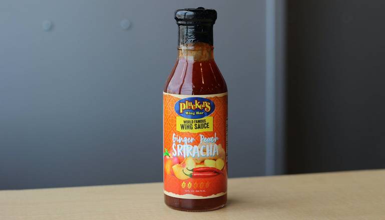 Order Bottle Ginger Peach Sriracha food online from Pluckers store, Stafford on bringmethat.com