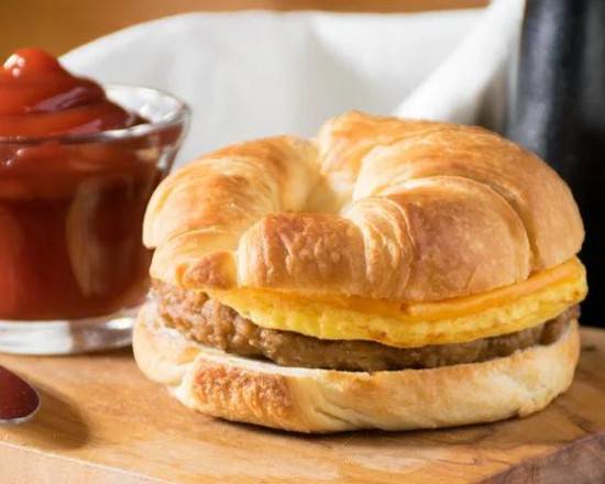 Order Sausage, Egg & Cheese Croissant Meal food online from FFK Quick Eats store, Lilburn on bringmethat.com
