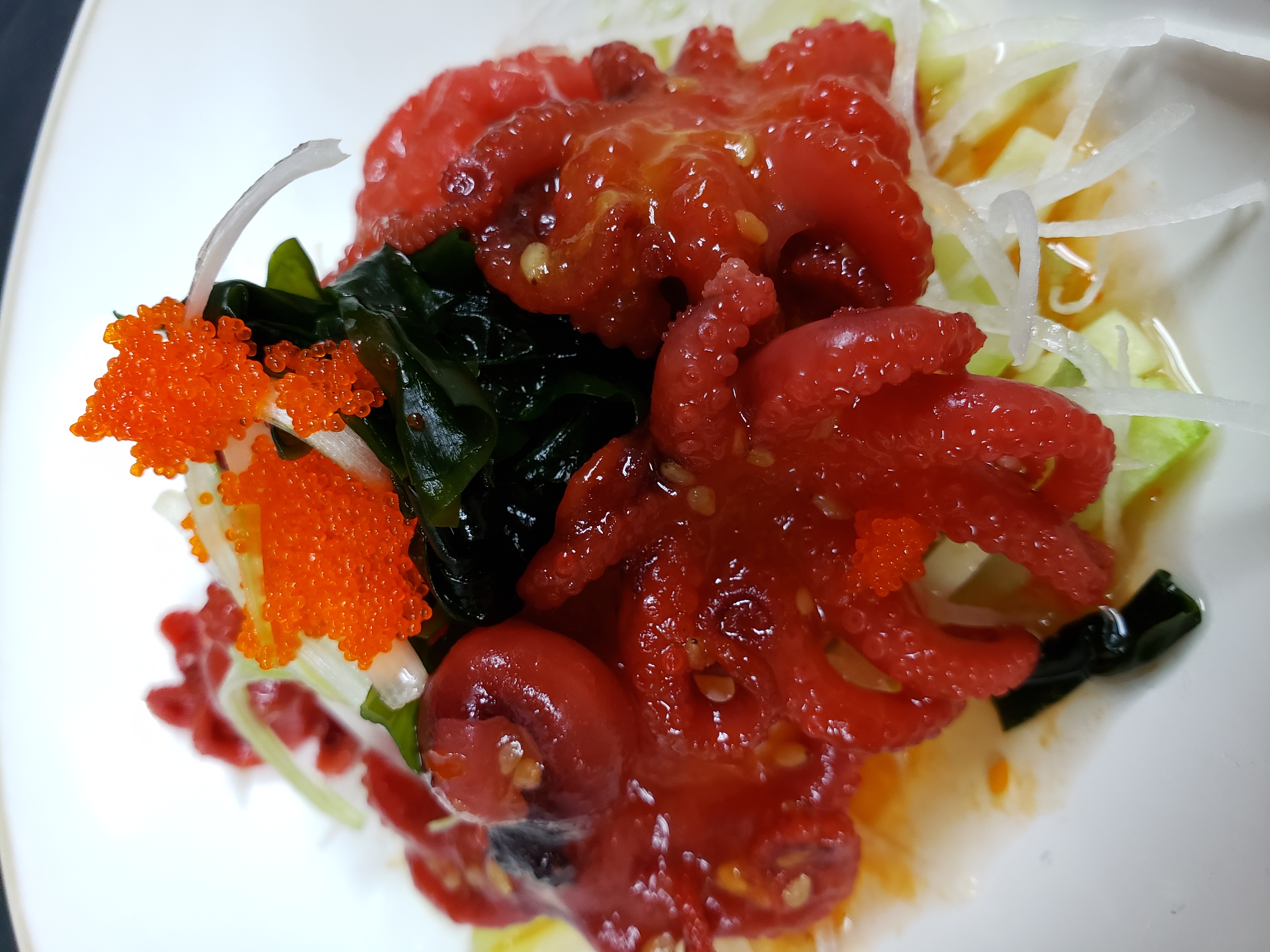 Order Baby Tako Salad food online from Sushishima Japanese Restaurant store, San Antonio on bringmethat.com