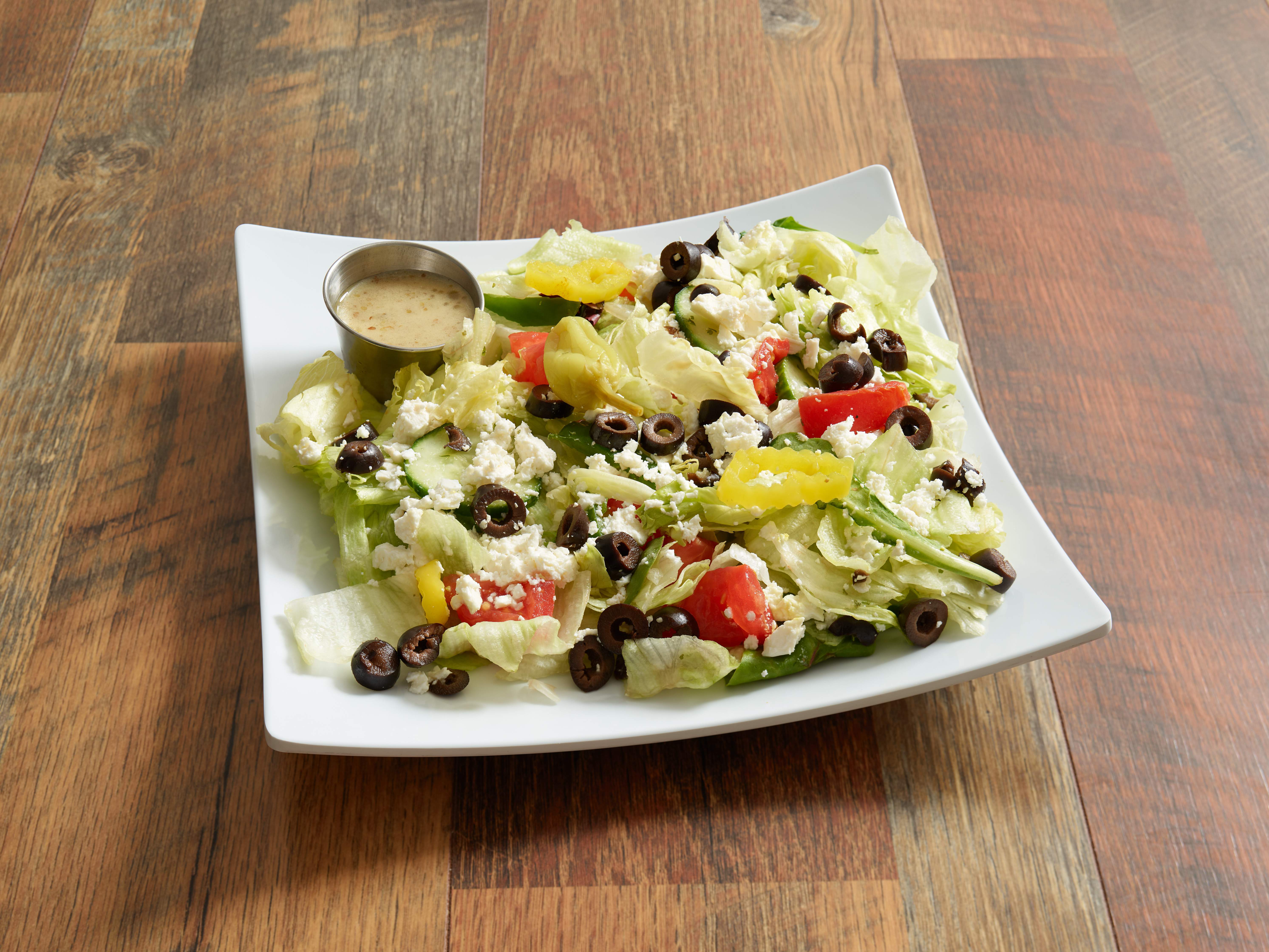 Order Greek Salad (100% Vegetarian) food online from Pizza Plus store, Binghamton on bringmethat.com