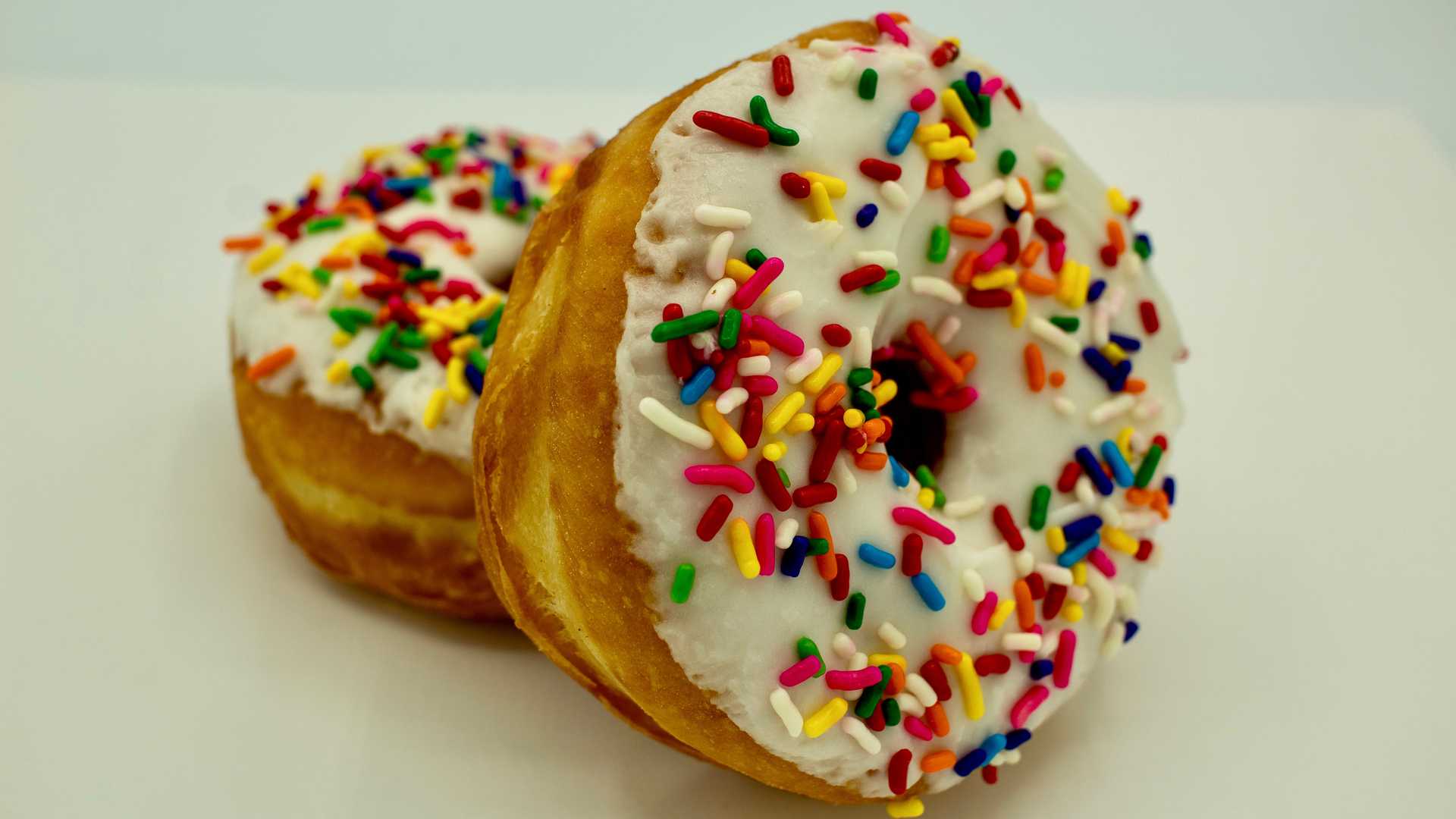Order White Sprinkle Donut food online from Shipley Do-Nuts store, Clarksville on bringmethat.com
