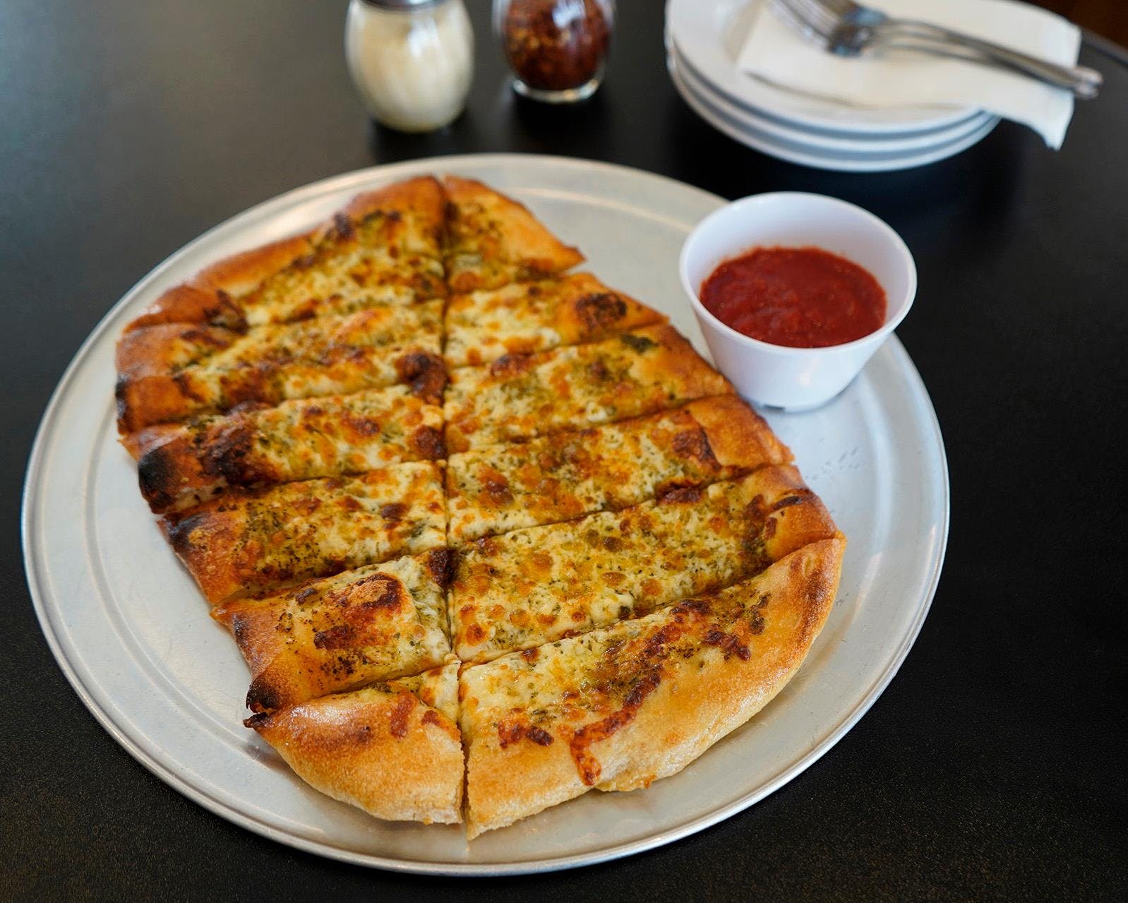 Order Pesto Cheese Bread - Appetizer food online from Spitfire Craft Pizza store, Boise on bringmethat.com