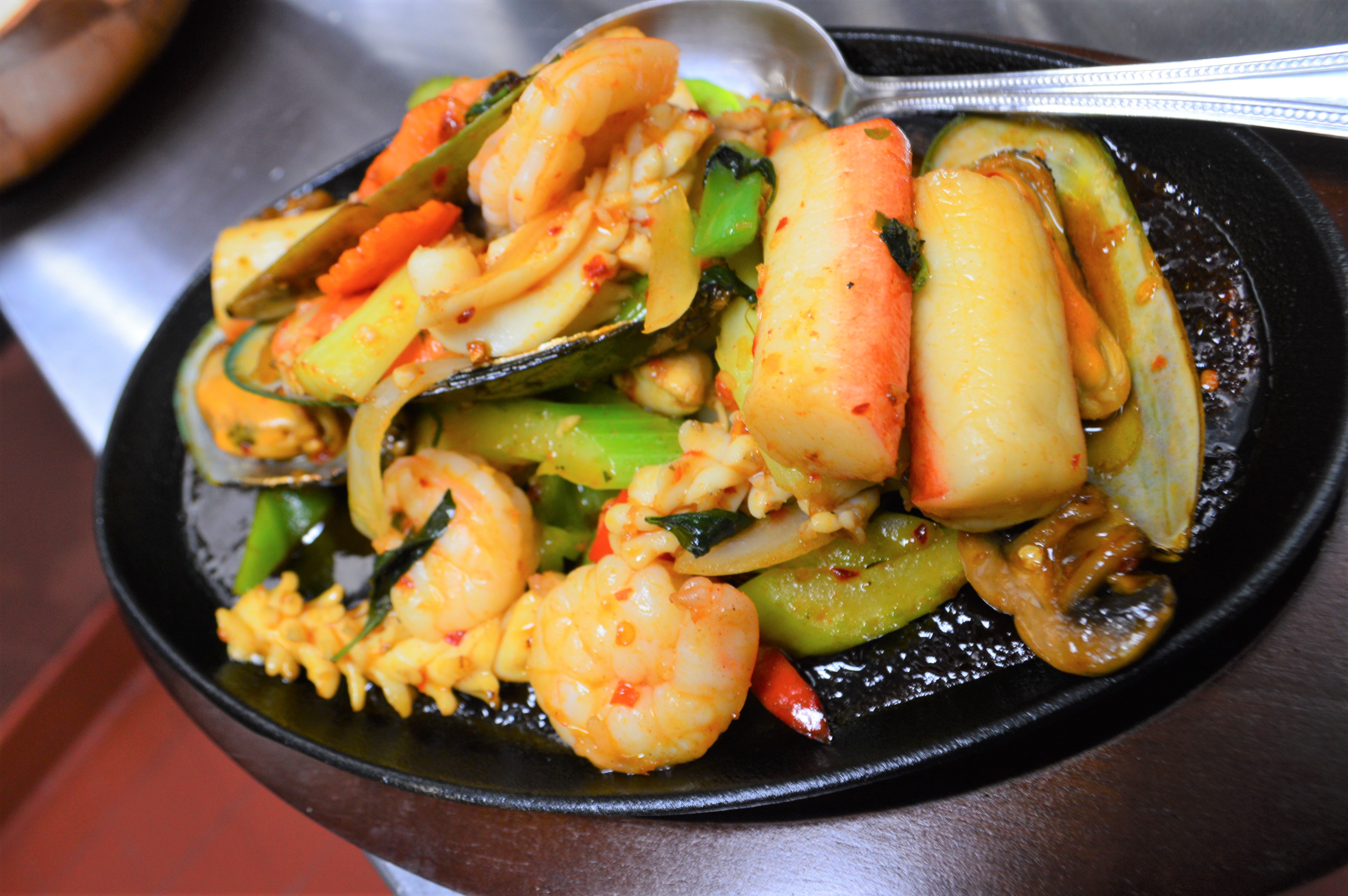 Order 49. Sizzling Seafood food online from Rialto Thai Kitchen store, Rialto on bringmethat.com