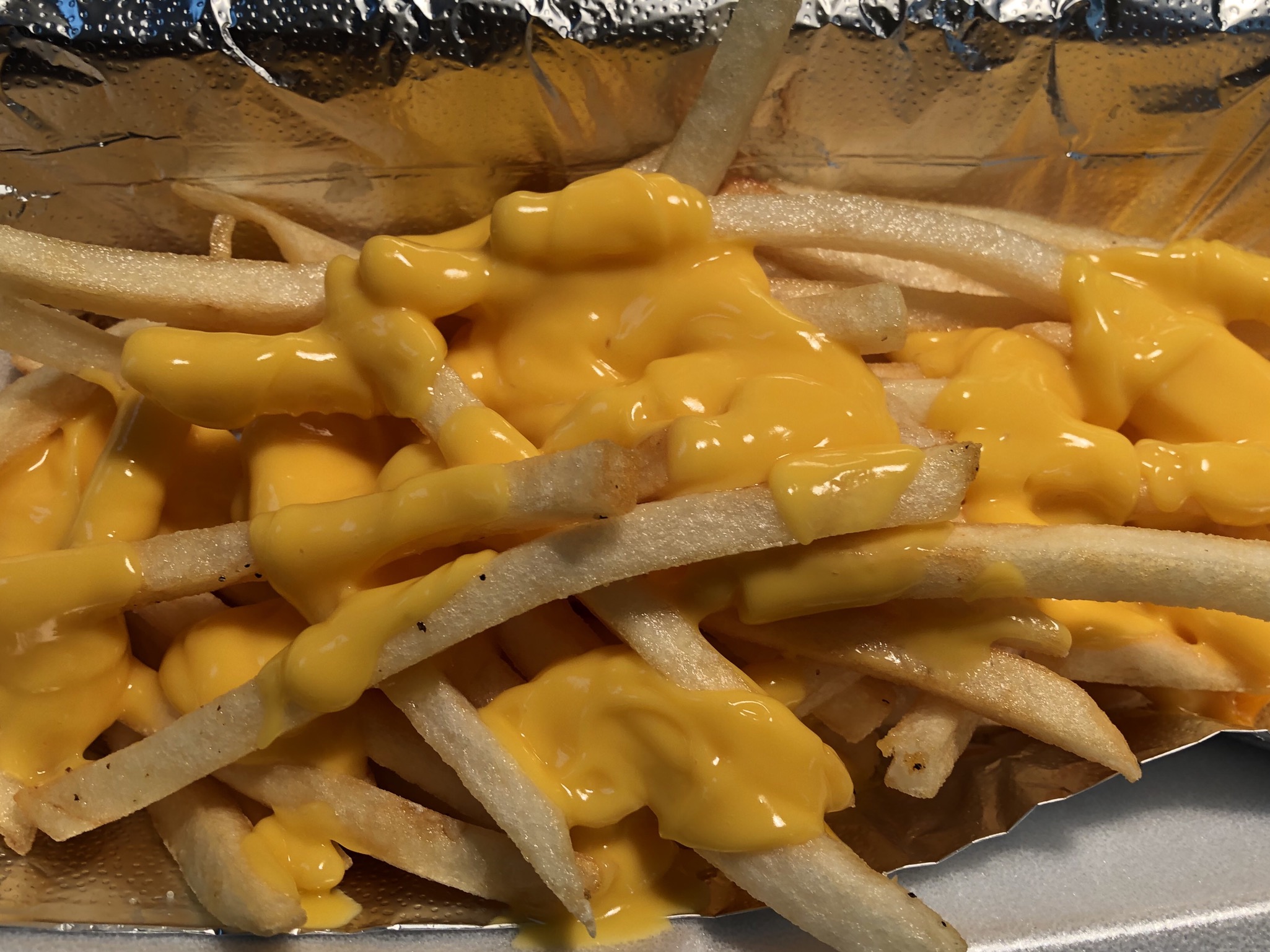 Order Cheese Fries food online from Big Tony's West Philly Cheesesteaks store, Dallas on bringmethat.com